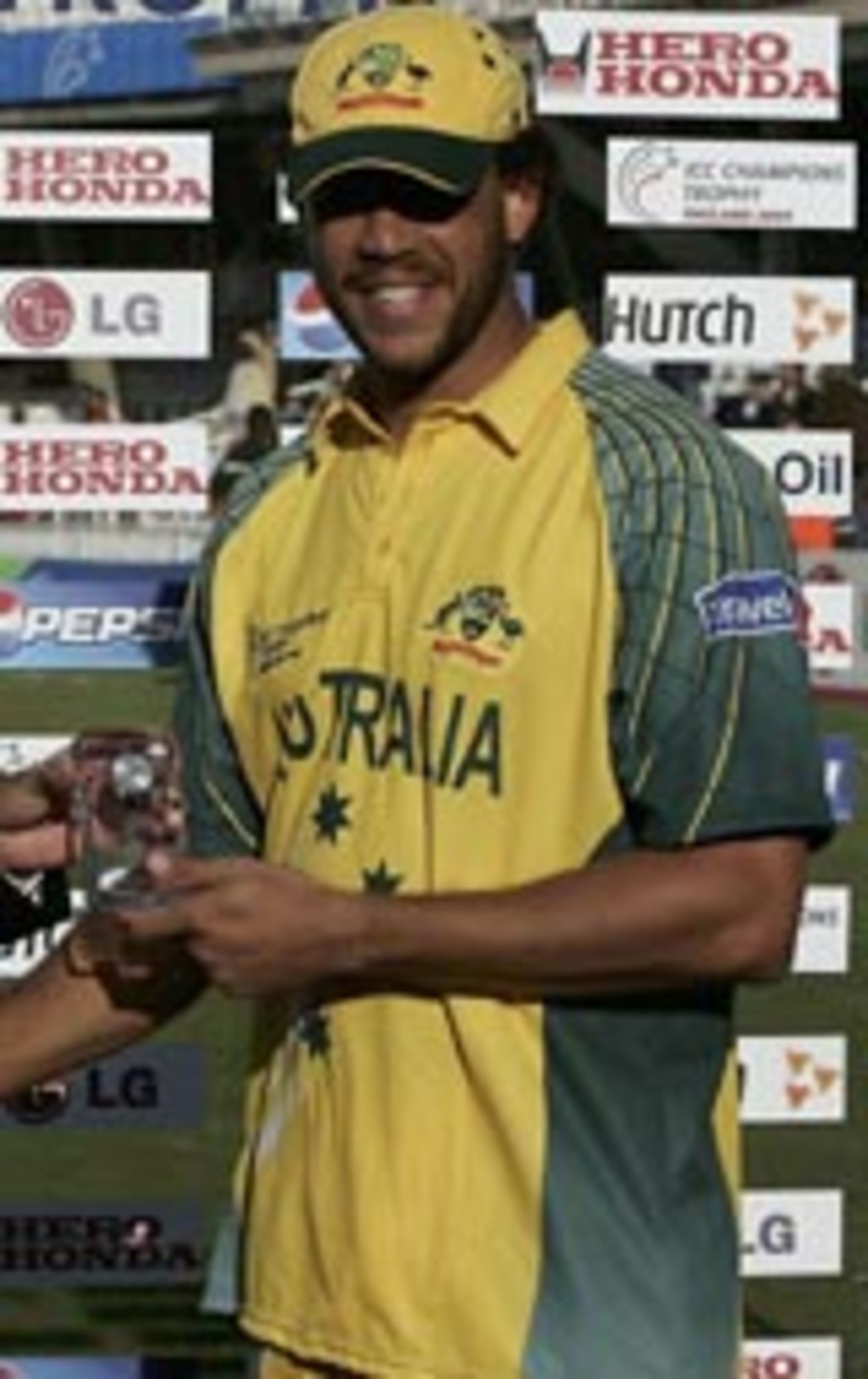 Andrew Symonds collects his man-of-the-match award, September 16 2004