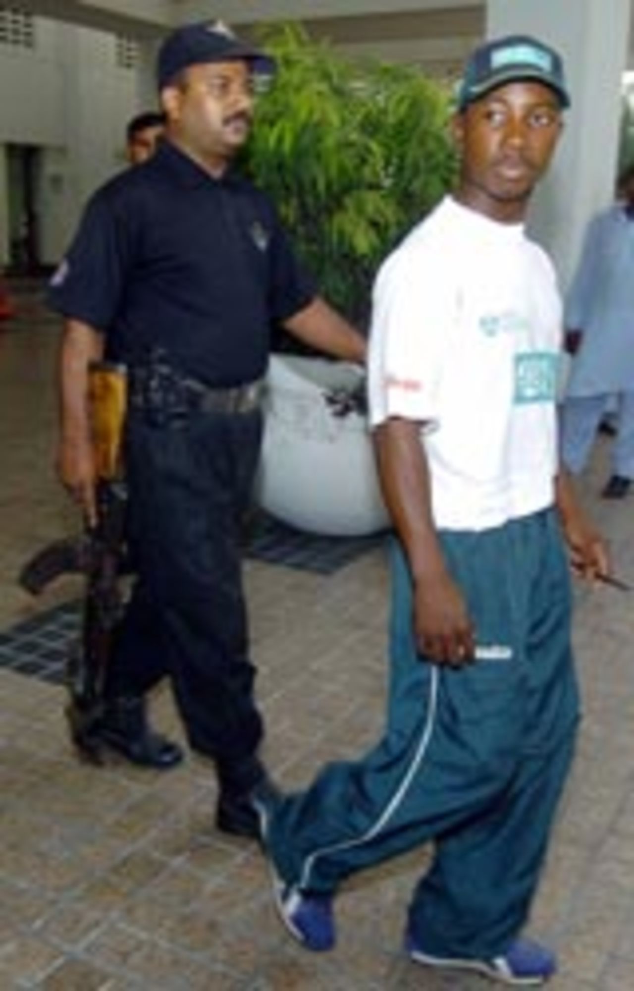 Tatenda Taibu arrives at a press conference in Lahore, September 18 2004