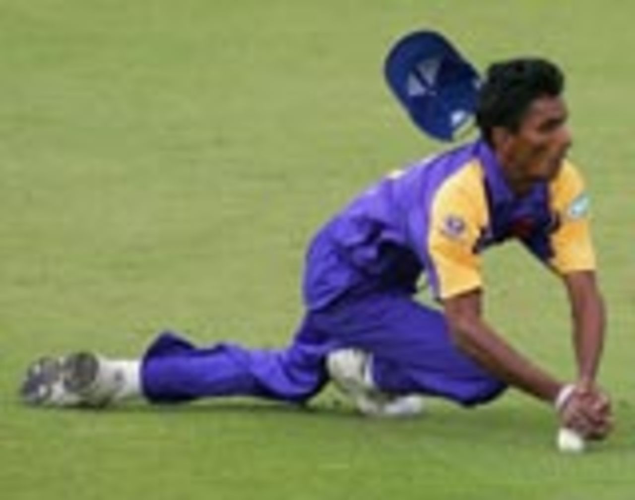 Upul Chandana puts down a chance in the field, England v Sri Lanka, ICC Champions Trophy, September 18 2004
