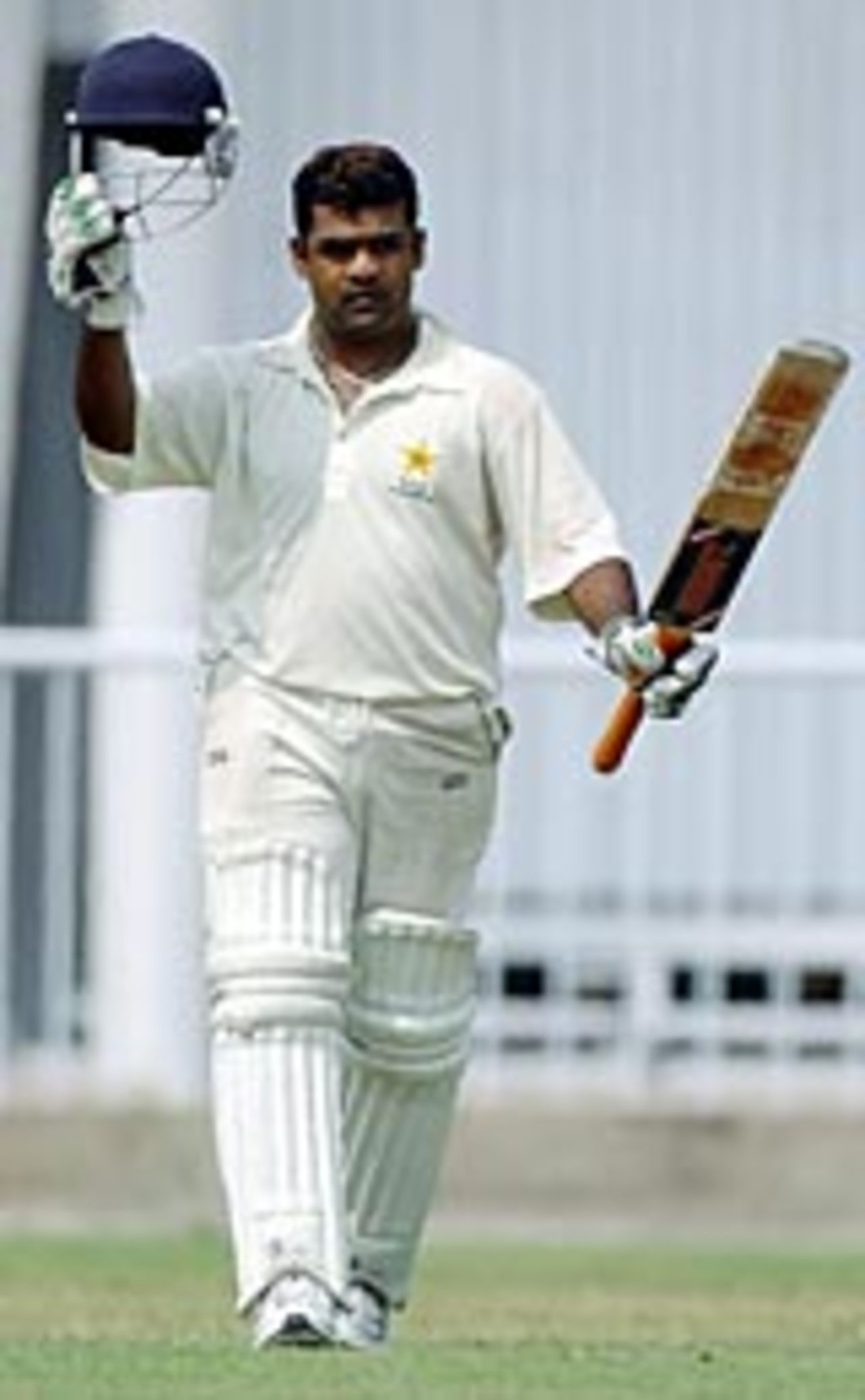 Ashar Zaidi acknowledges the applause on reaching 200, Zimbabwe v Pakistan Chairman XI, Sheikupura, September 20, 2004