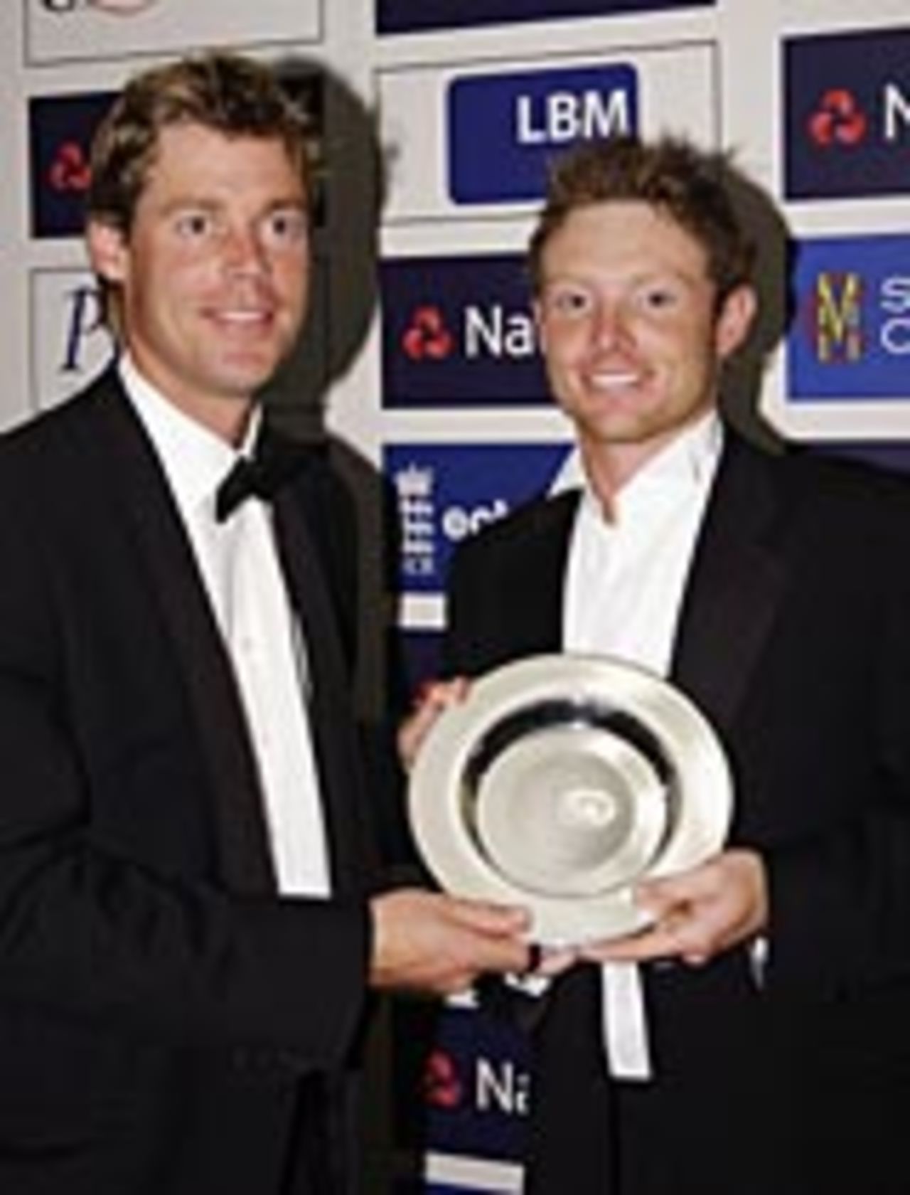 Nick Knight presents Ina Bell with the PCA Young Player of the Year award, September 20, 2004