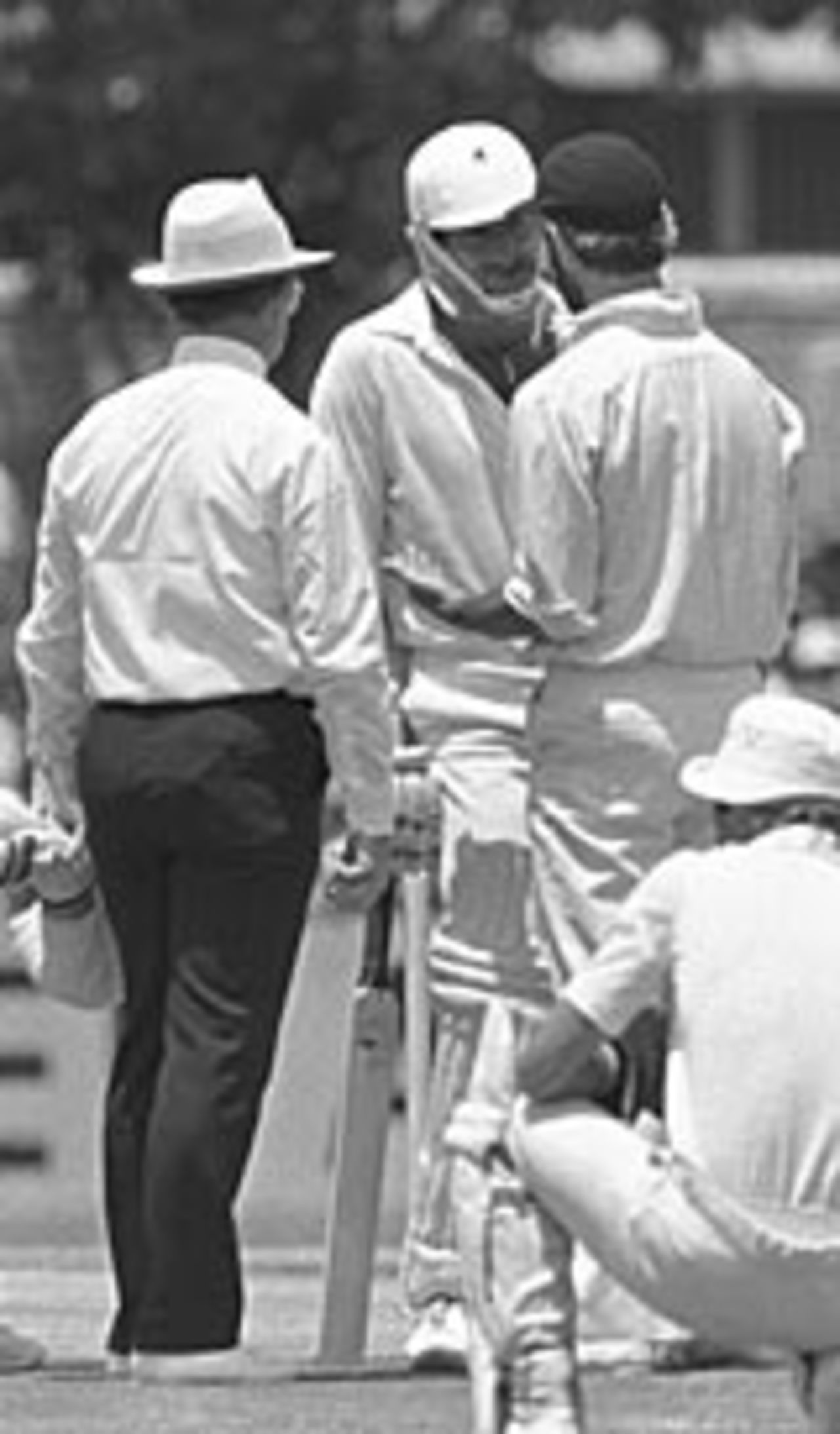 Dennis Lillee argues with Mike Brearley over the legality of Lillee's aluminium bat. Lillee eventually switched to a traditional wooden bat, Australia v England, 1st Test,  Perth, December 1979