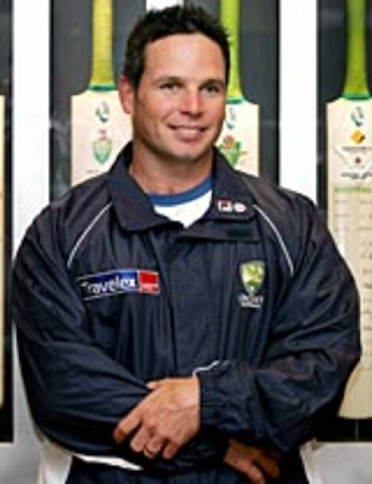 Brad Hodge smiles as he answers questions at the Australian Cricket Board offices before departing to join the Australian team for their tour of India, Melbourne, September 24, 2004