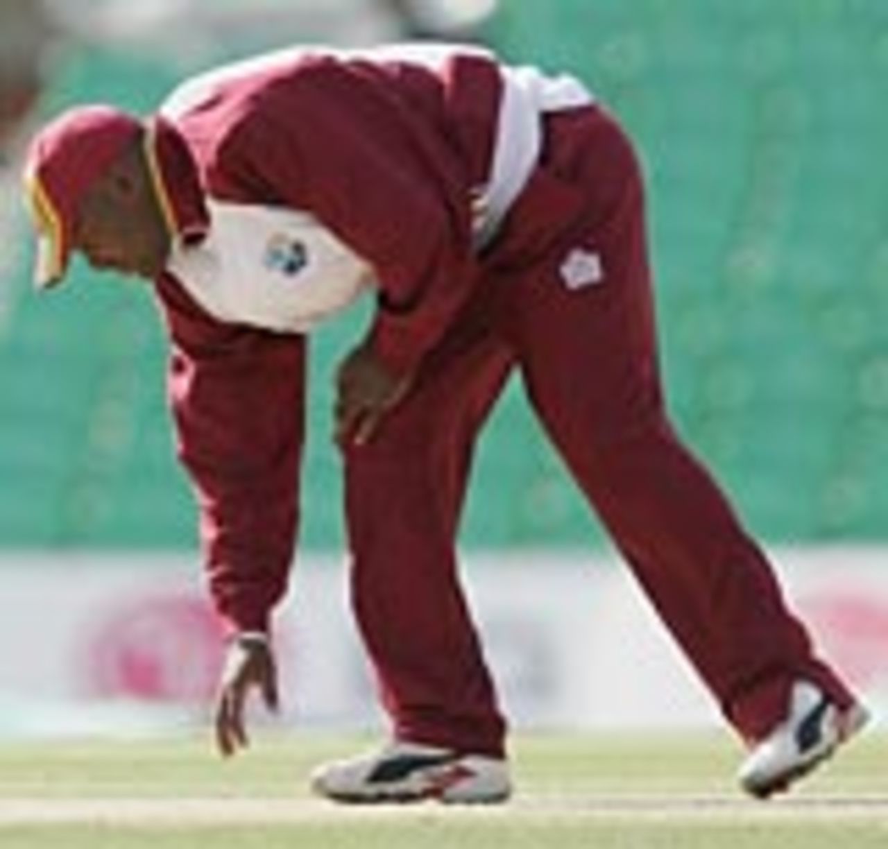 Brian Lara inspects the pitch at The Oval, September 24, 2004