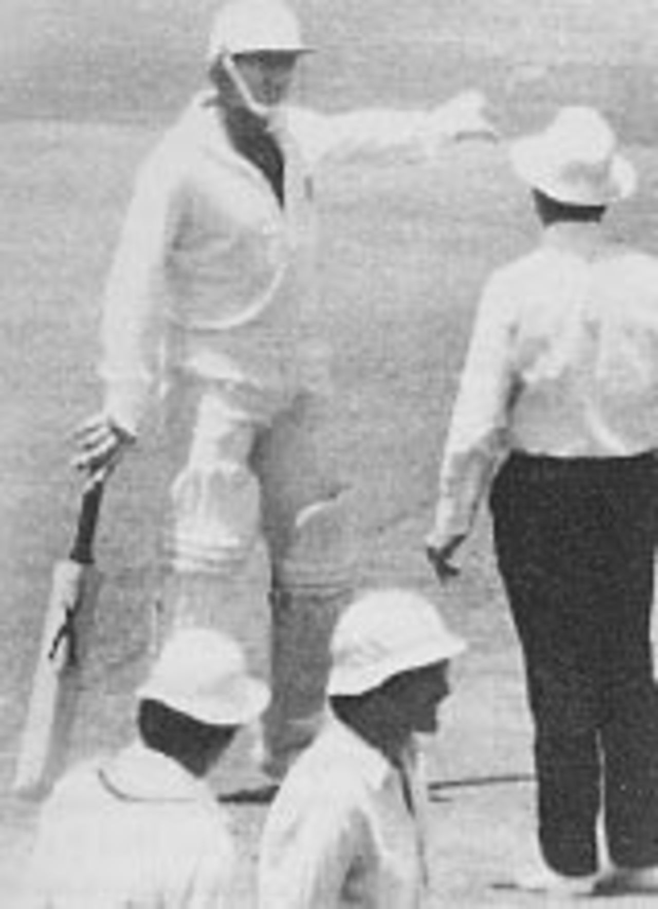 Dennis Lillee argues with umpire Max O'Connell over the legality of Lillee's aluminium bat. Lillee eventually switched to a traditional wooden bat, Australia v England, 1st Test,  Perth, December 1979