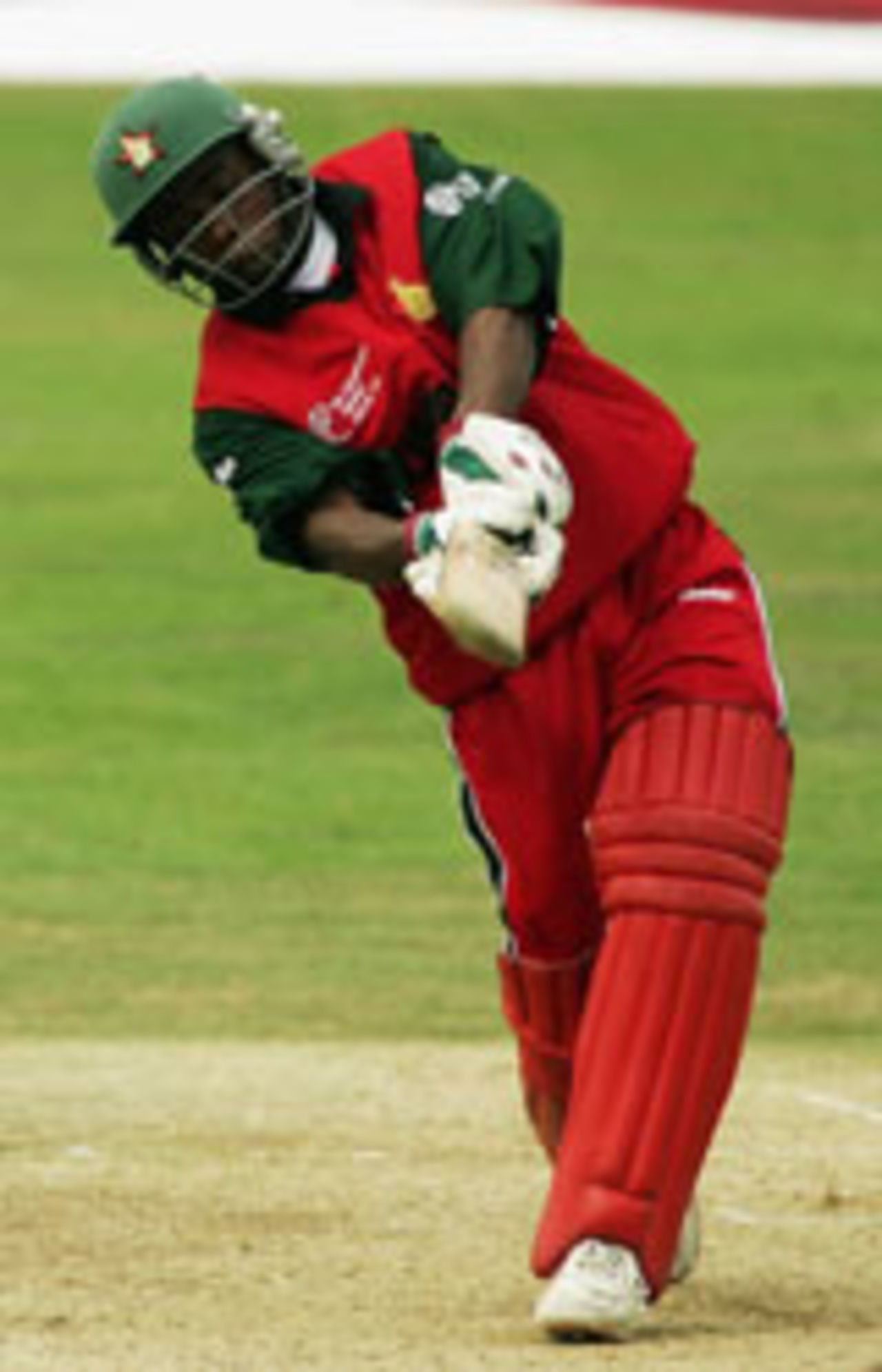 Prosper Utseya plays a booming drive, Zimbabwe v Sri Lanka, ICC Champions Trophy, September 14 2004