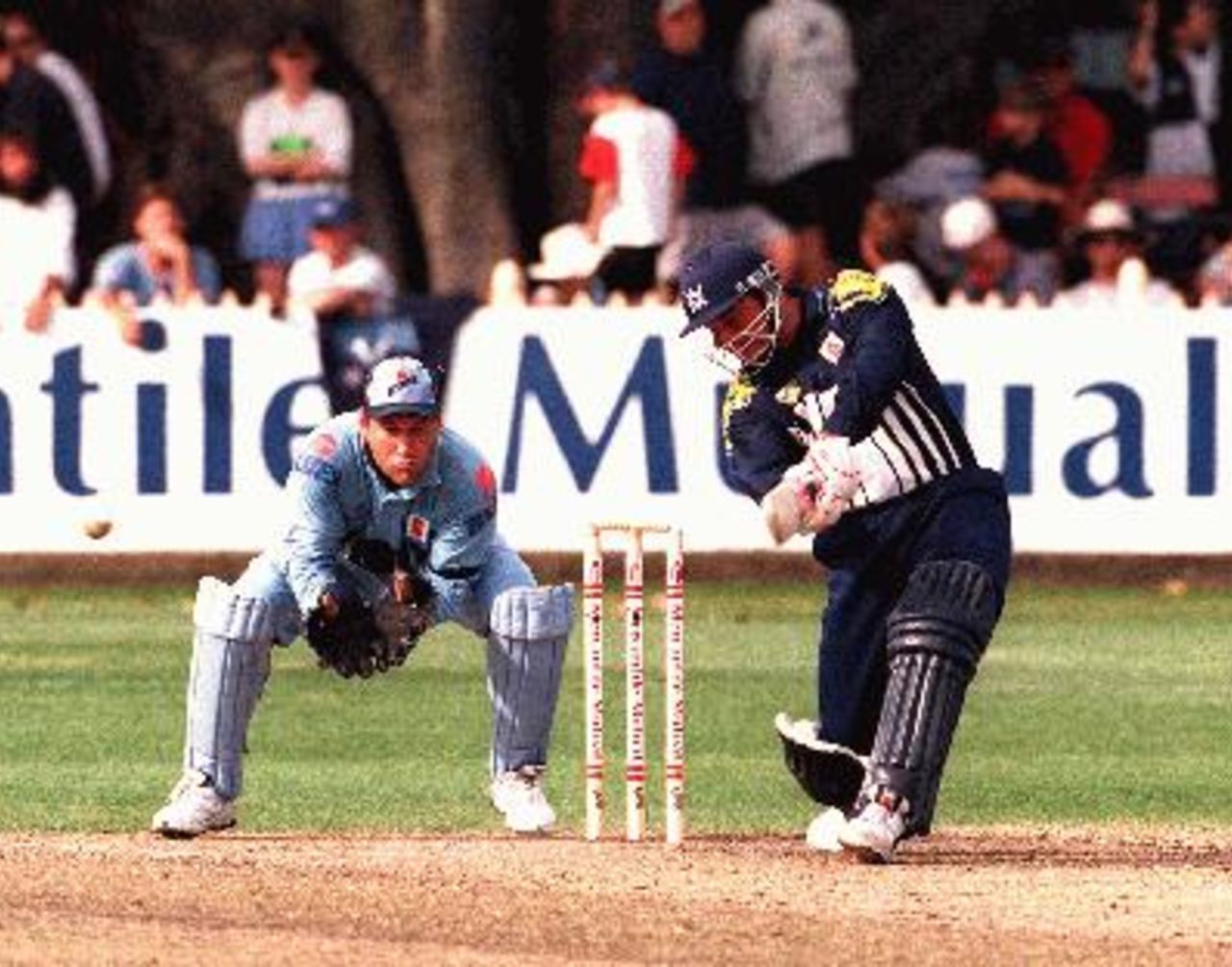 Darren Berry drives during the Blues V Bushrangers at Nth Sydney Oval, 26 October 1997