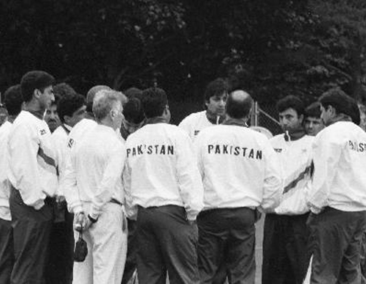 The Pakistani team huddle on the field after the match with the Inzamam episode