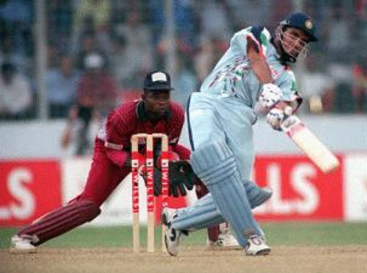 Ganguly lofts a cross batted shot during his innings of 83 Jacobs is the 'keeper Wills International Cup, 1998/99, 2nd Semi-Final India v West Indies Bangabandhu National Stadium, Dhaka (day/night) 31 October 1998
