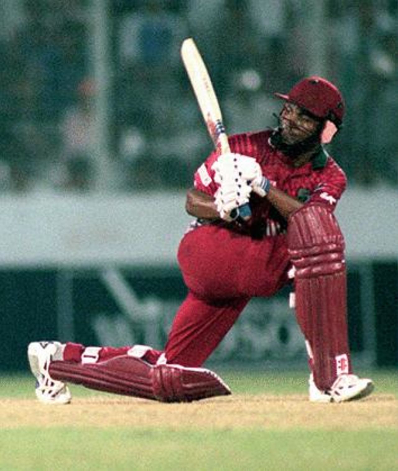 Lara sweeps during his innings of 60* Wills International Cup, 1998/99, 2nd Semi-Final India v West Indies Bangabandhu National Stadium, Dhaka (day/night) 31 October 1998