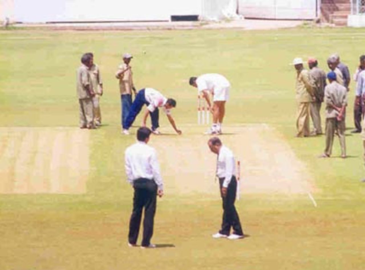 Umpires and two team captains check the pitch whether it is suitable  for playing, Chinnaswamy Stadium, Irani Trophy, 1999-2000, Bangalore