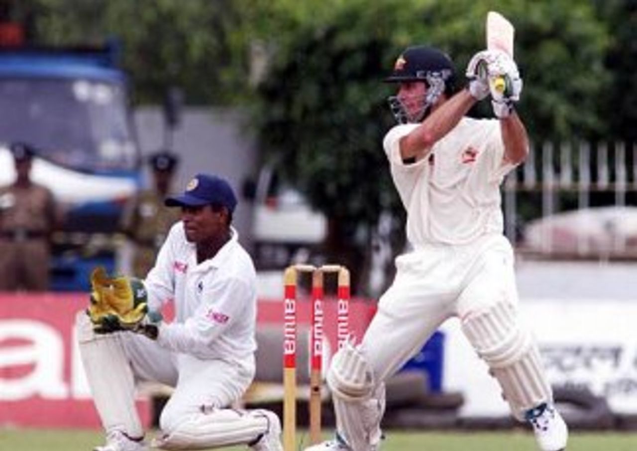 1 Oct 1999: Ricky Ponting of Australia hits out with Romesh Kaluwitharana of Sri Lanka looking on, on day two of the 3rd Test between Sri Lanka and Australia at Singhalese Sports Club, Colombo, Sri Lanka.