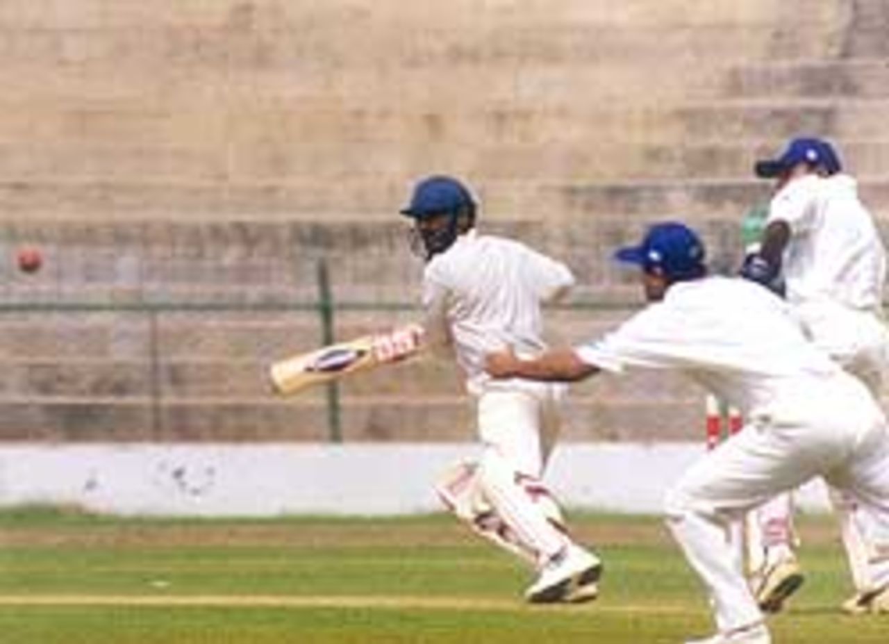Sitanshu Kotak cuts to the boundary during his century in the Rest of India innings, Chinnaswamy Stadium, Irani Trophy, 1999-2000, Bangalore