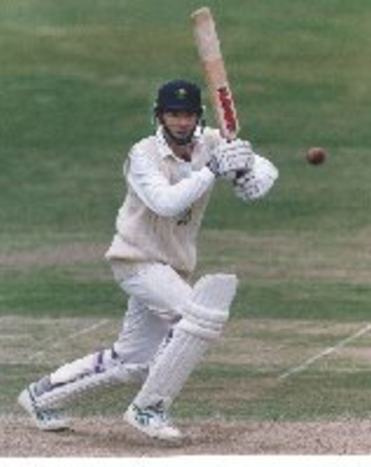 Steve James cover drives during the Championship match with Middlesex at Colwyn Bay in June 1995