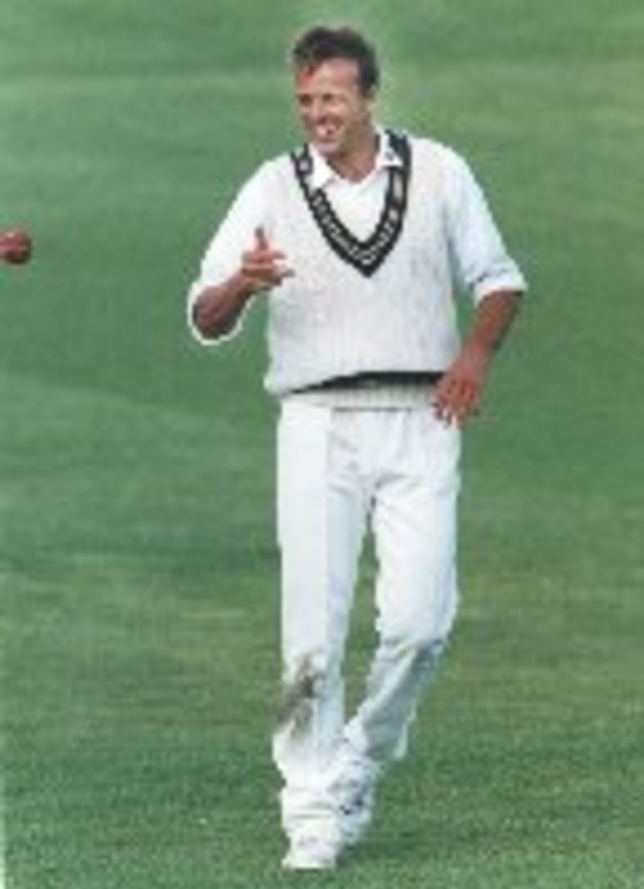 A happy Roland Lefebvre walks back to his bowling mark - Glamorgan v Durham, Colwyn Bay, 1993