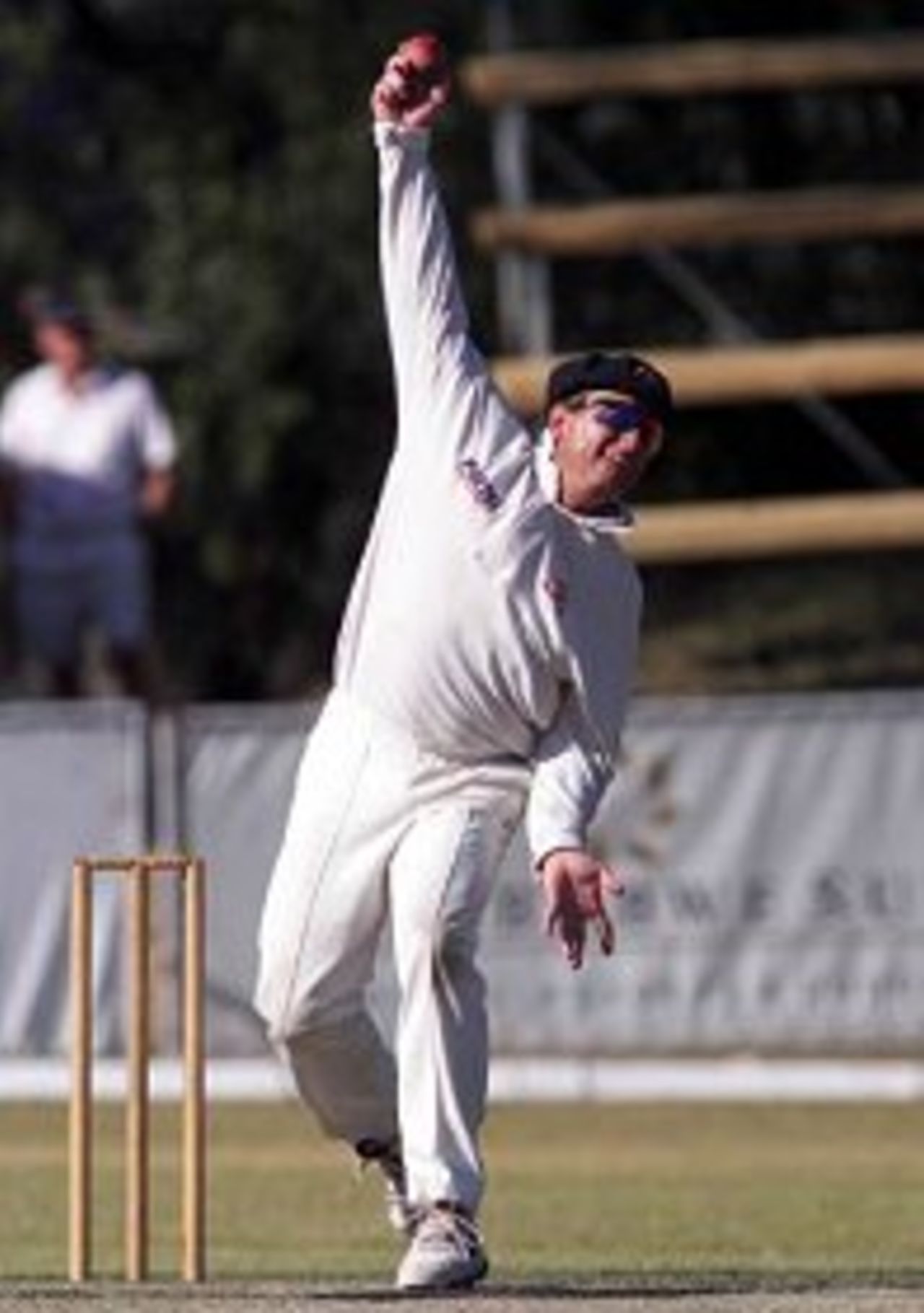 11 Oct 1999: Ian Healy of Australia the usual wicketkeeper, in the unusual position of bowling, during the tour match between the Zimbabwe President's XI and Australia at Queen's Sports Club, Bulawayo, Zimbabwe.