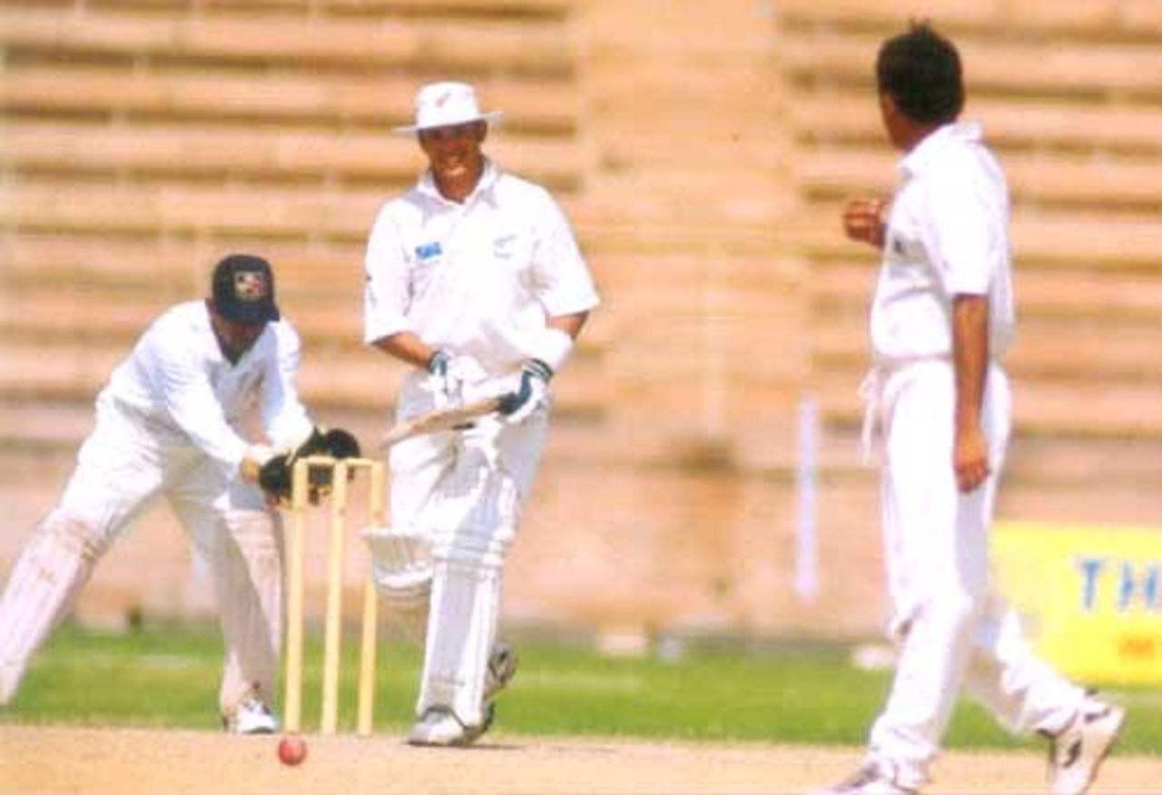Adam Parore's follow through after defensively playing a Virender Shewag delivery, during day three of Indian Board President's XI v New Zealanders at Barkatullah Khan Stadium, Jodhpur, 7 October 1999, New Zealand in India, 1999/00