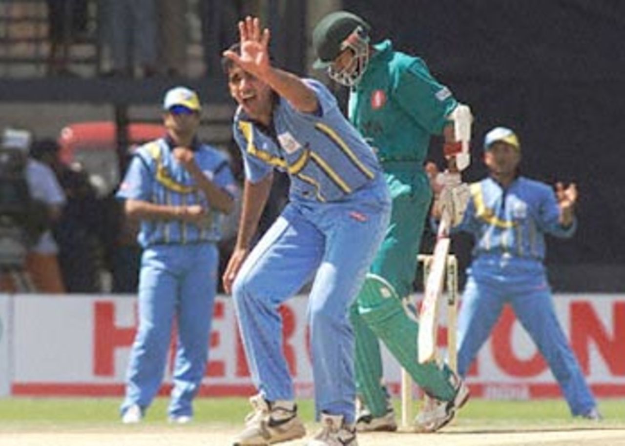 India's bowler Zaheer Khan shouting for a Kenya player during their opening match on the 11 nation's International Cricket Council ICC tournament in Nairobi's gymkhana. ICC KnockOut 2000/01, Preliminary Quarter Final Kenya v India, Gymkhana Club Ground, Nairobi 03 Oct 2000
