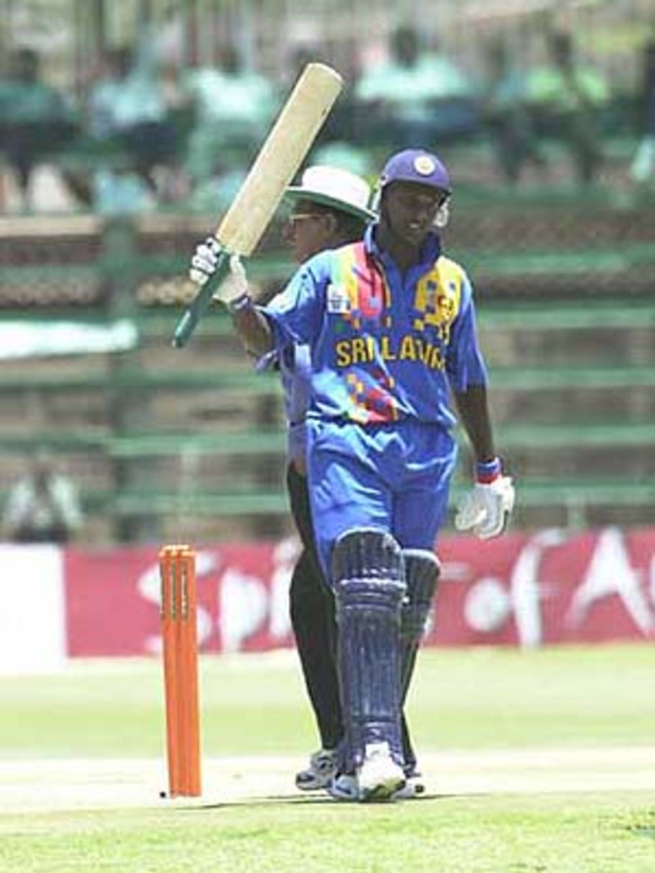 Gunawardene raises his bat after making his century, ICC KnockOut, 2000/01, 2nd Preliminary Quarter Final, Sri Lanka v West Indies, Gymkhana Club Ground, Nairobi, 04 October 2000.