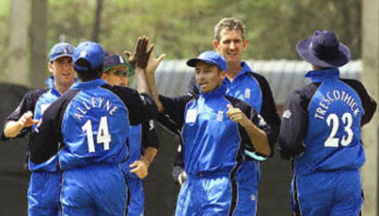 England bowler A Caddick (2nd r) celebrates with team-mates after bowling out Bangladesh batsman Al sharier on the 3rd match of the of the ICC KnockOut, 2000/01, 3rd Preliminary Quarter Final, Bangladesh v England, Gymkhana Club Ground, Nairobi, 05 October 2000.