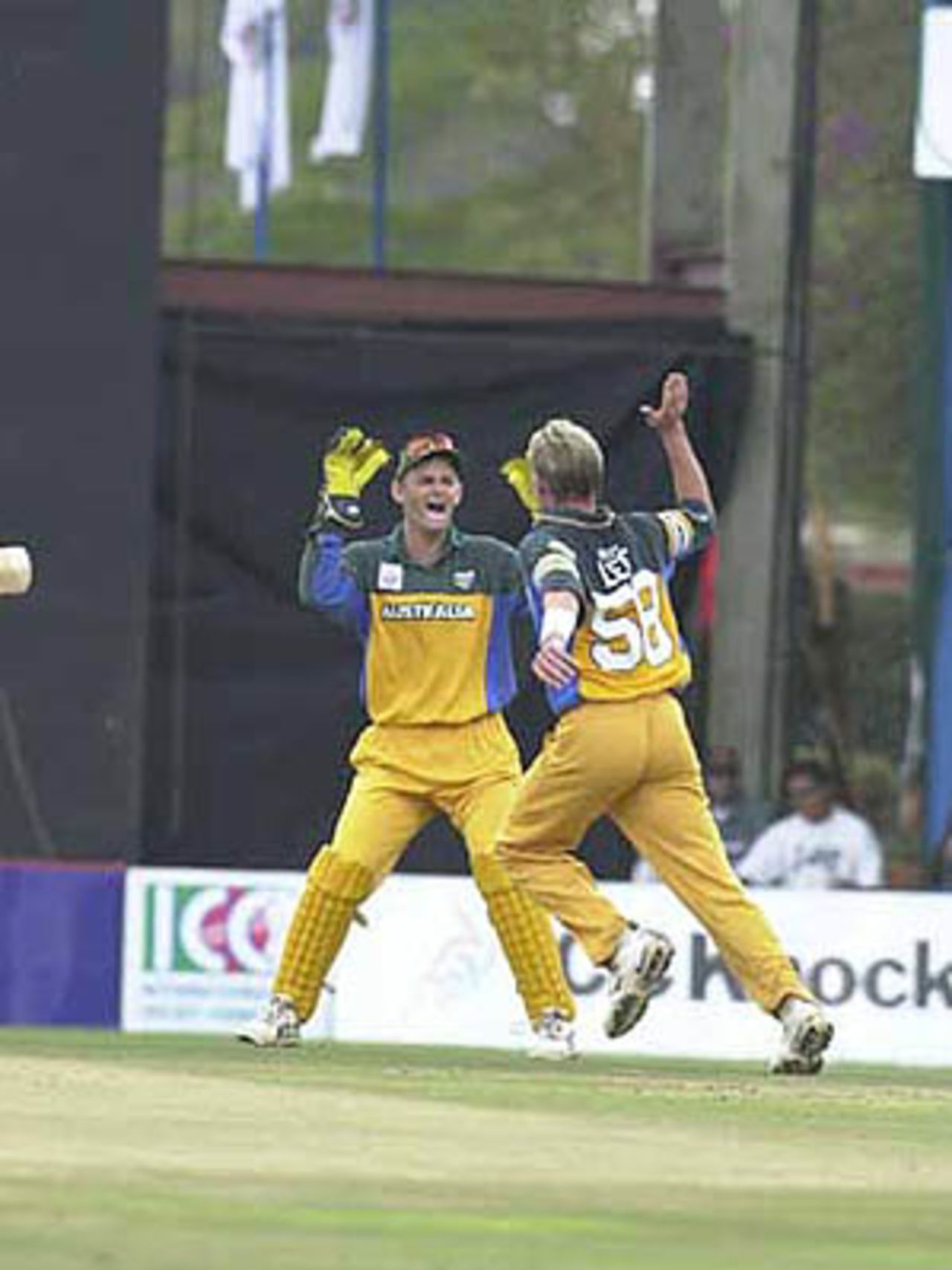 A delighted Brett Lee being congratulated by Adam Gilchrist, ICC KnockOut, 2000/01, 1st Quarter Final, Australia v India, Gymkhana Club Ground, Nairobi, 07 October 2000.
