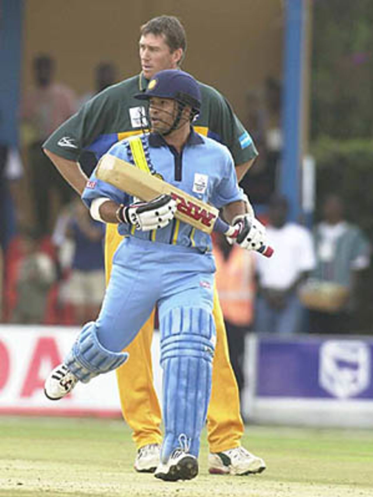 Tendulkar follows the course of the ball as he completes a single, ICC KnockOut, 2000/01, 1st Quarter Final, Australia v India, Gymkhana Club Ground, Nairobi, 07 October 2000.