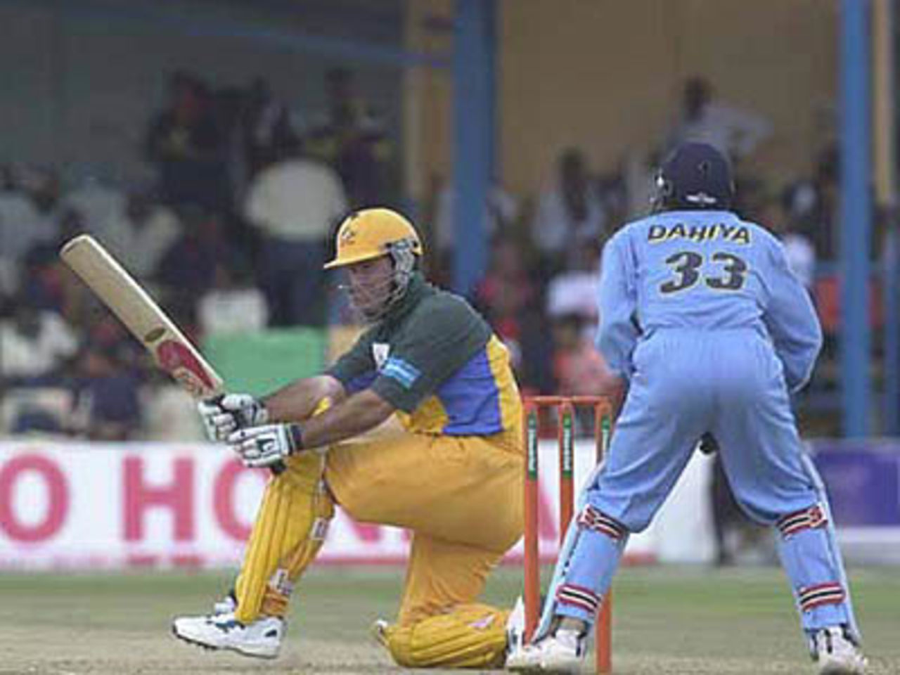 Ponting sweeps hard as Vijay Dahiya watches from behind the stumps, ICC KnockOut, 2000/01, 1st Quarter Final, Australia v India, Gymkhana Club Ground, Nairobi, 07 October 2000.