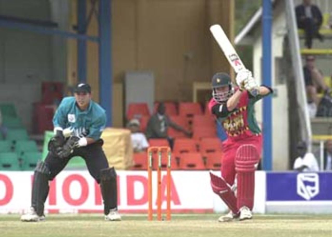 Grant Flower plays a flowing cover drive. ICC KnockOut, 2000/01, 3rd Quarter Final, New Zealand v Zimbabwe, Gymkhana Club Ground, Nairobi,09 October 2000.