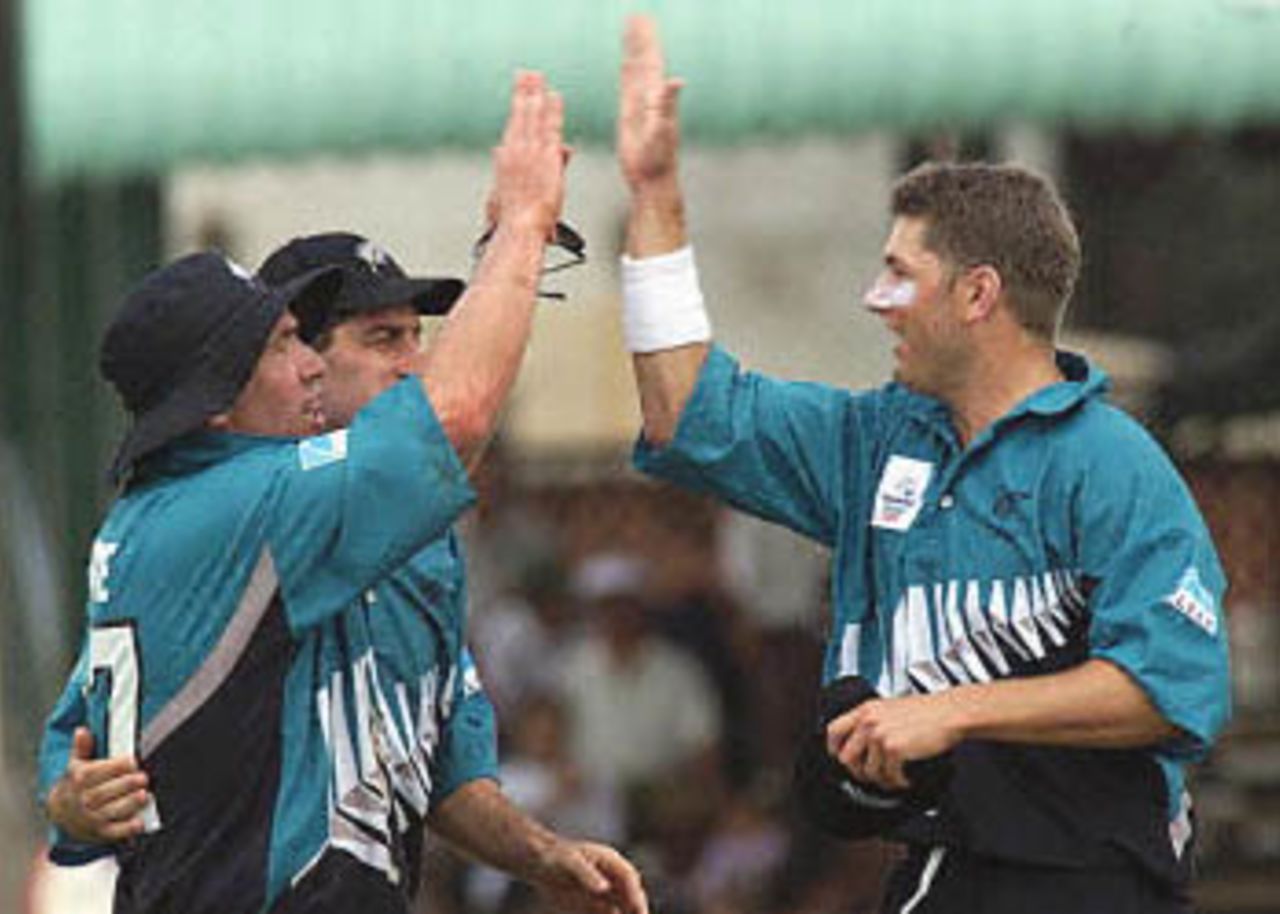 Roger Twose, Craig Spearman and Geoff Allott celebrate the fall of a Zimbabwe wicket, ICC KnockOut, 2000/01, 3rd Quarter Final, New Zealand v Zimbabwe, Gymkhana Club Ground, Nairobi, 09 October 2000.