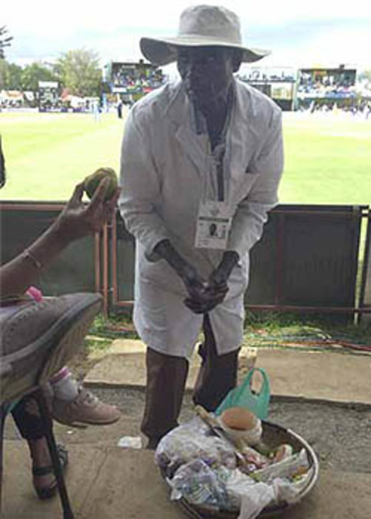A fruit seller displaying his products in the Gymkhana ground, Nairobi