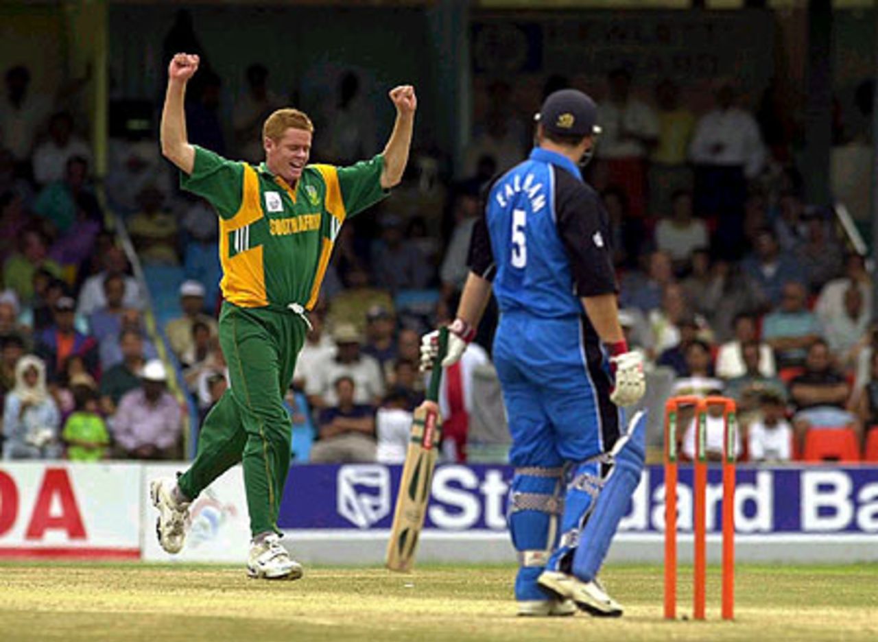 10 Oct 2000: Shaun Pollock of South Africa celebrates taking the wicket of Mark Ealham of England during the England v South Africa second round match of the ICC Knockout tournament at the Gymkhana Club Ground, Nairobi, Kenya.