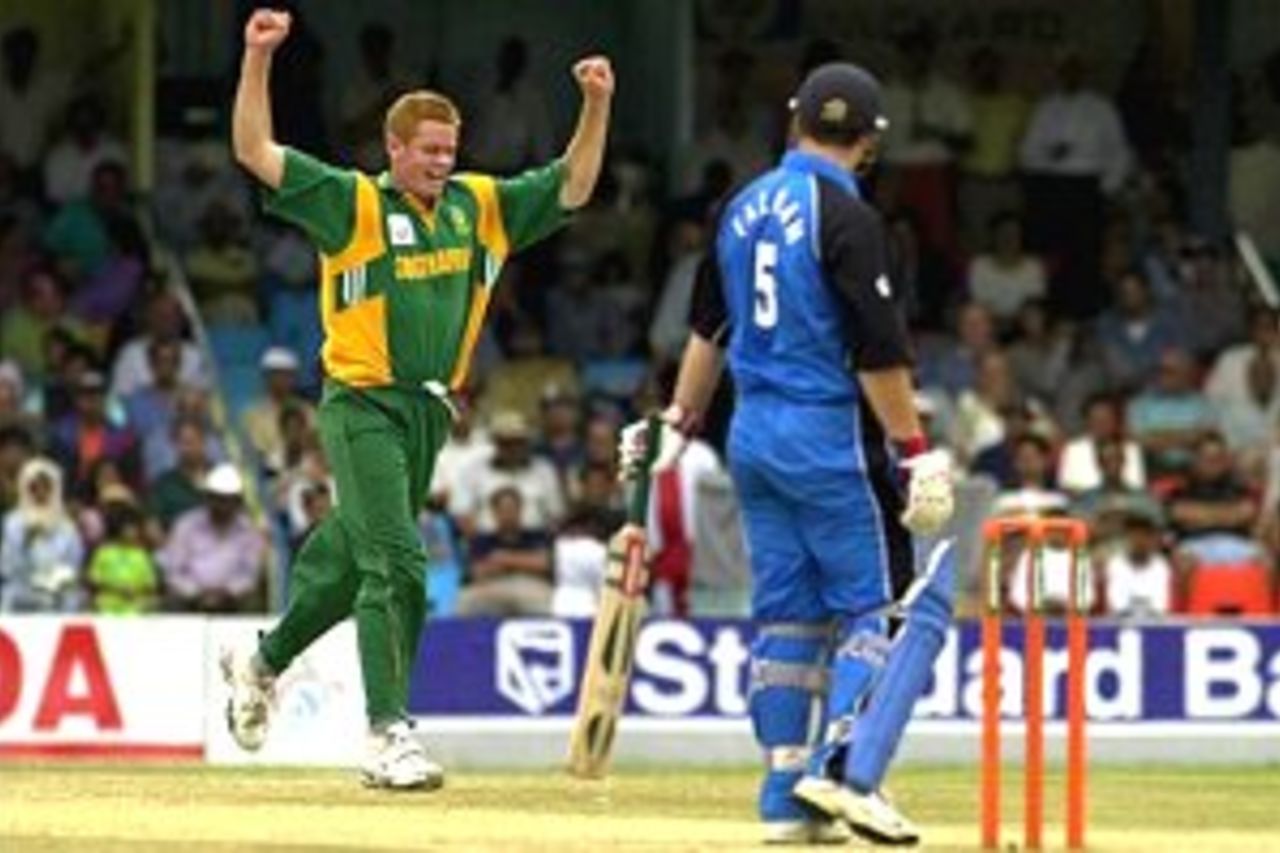 10 Oct 2000: Shaun Pollock of South Africa celebrates taking the wicket of Mark Ealham of England during the England v South Africa second round match of the ICC Knockout tournament at the Gymkhana Club Ground, Nairobi, Kenya