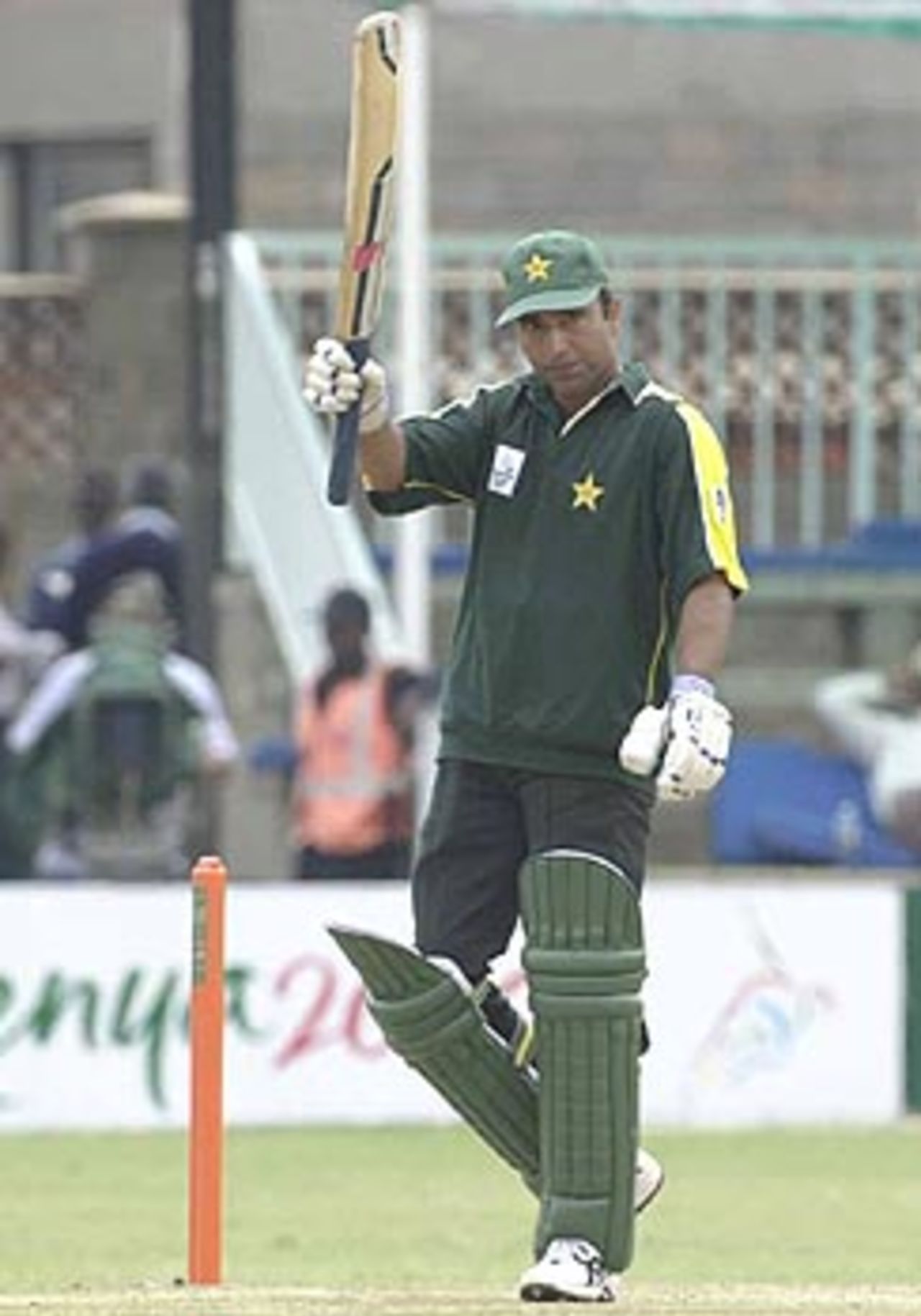Saeed Anwar raises his bat after scoring a century. ICC KnockOut 2000/01, 1st Semi Final, New Zealand v Pakistan Gymkhana Club Ground, Nairobi, 11 October 2000