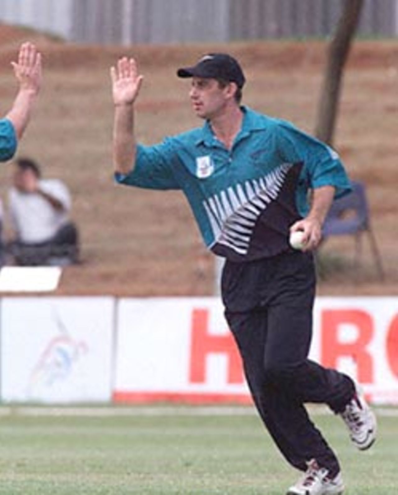 Craig Spearman celebrates the fall of Pakistan batsman Imran Nazir. ICC KnockOut 2000/01, 1st Semi Final, New Zealand v Pakistan, Gymkhana Club Ground, Nairobi, 11 October 2000