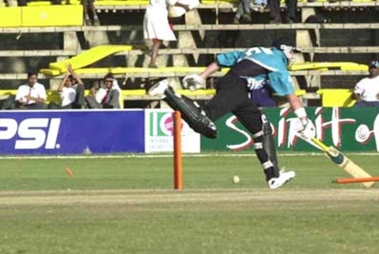 Chris Harris trying to steal a run is run out of a direct hit. ICC KnockOut 2000/01, 1st Semi Final, New Zealand v Pakistan, Gymkhana Club Ground, Nairobi, 11 October 2000