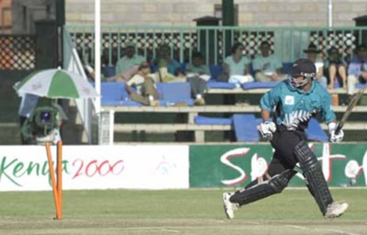 Adam Parore looks back to see his stumps castled. ICC KnockOut 2000/01, 1st Semi Final, New Zealand v Pakistan, Gymkhana Club Ground, Nairobi, 11 October 2000