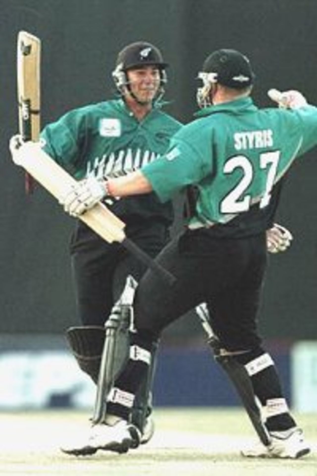 11 Oct 2000: Craig McMillan of New Zealand (left) celebrates with Scott Styris of New Zealand as they score the winning runs in the Semi final of the New Zealand v Pakistan ICC Knockout Trophy tournament at the Gymkhana Club Ground, Nairobi, Kenya.