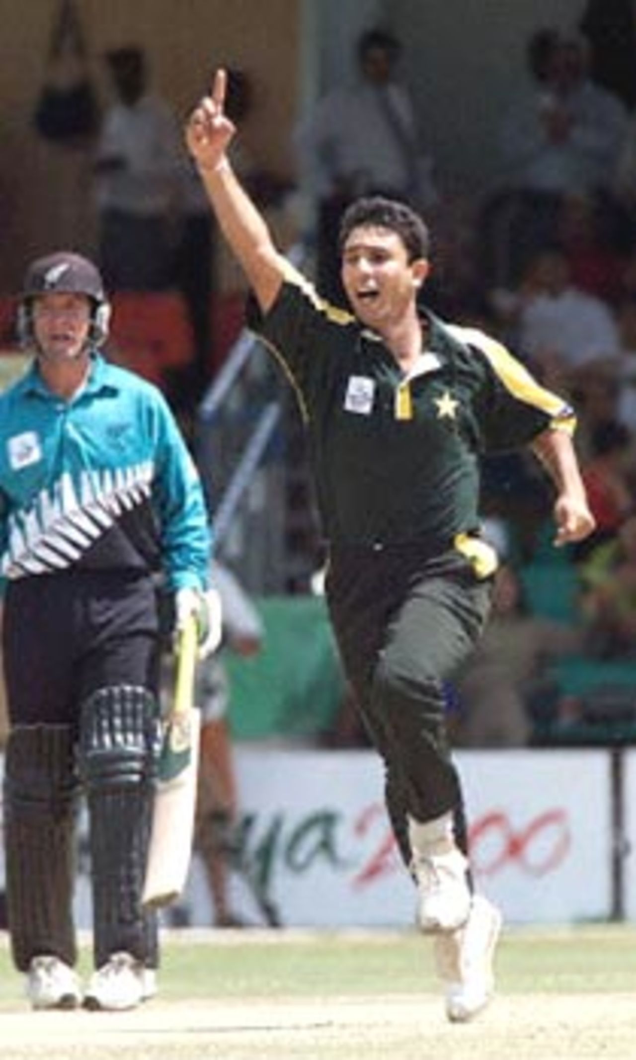 Azhar Mahmood celebrates the fall of Spearman's wicket. ICC KnockOut 2000/01, 1st Semi Final, New Zealand v Pakistan, Gymkhana Club Ground, Nairobi, 11 October 2000