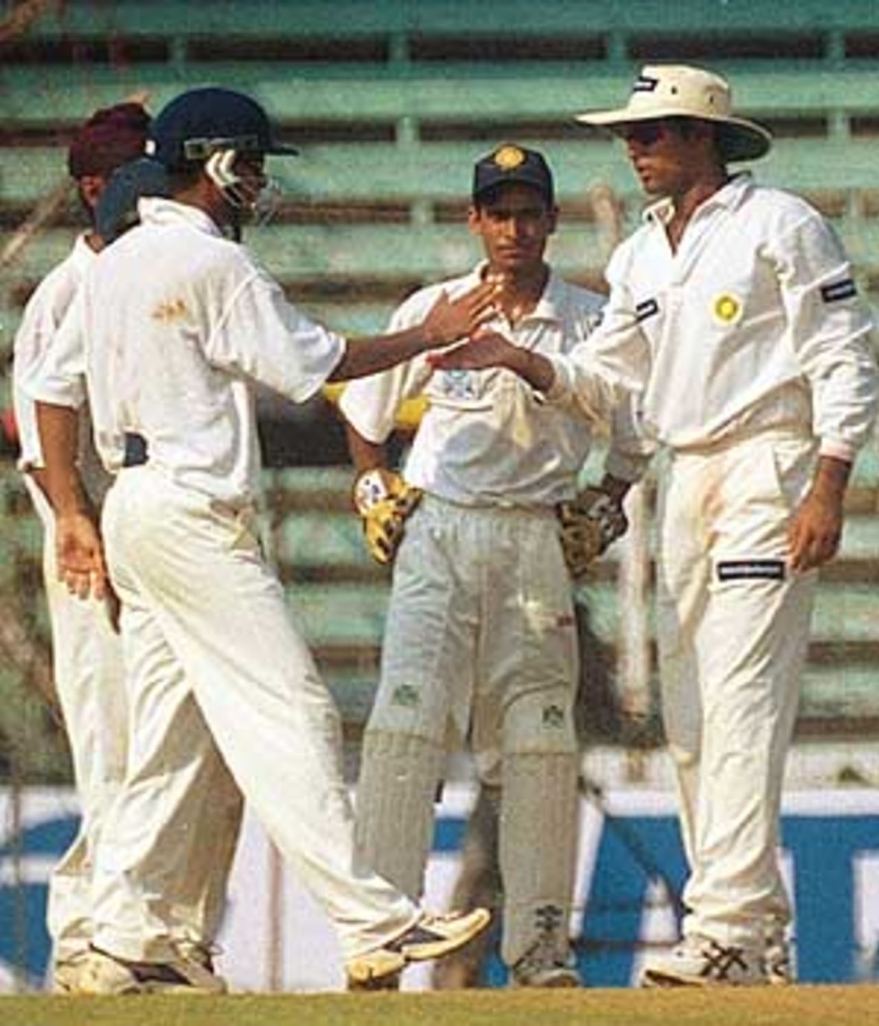 Laxman celebrates with teammates after taking a simple catch, Irani Trophy, 2000/01, Mumbai v Rest of India, Wankhede Stadium, Mumbai, 13-17 October 2000 (Day 1).