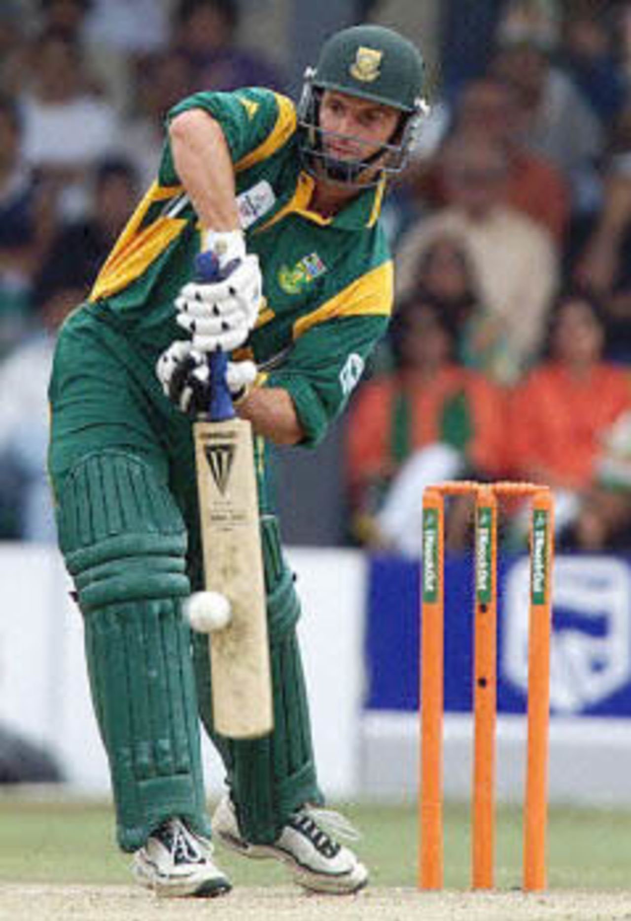 Gary Kirsten drives the ball past the bowler, ICC KnockOut, 2000/01, 2nd Semi Final, India v South Africa, Gymkhana Club Ground, Nairobi, 13 October 2000.