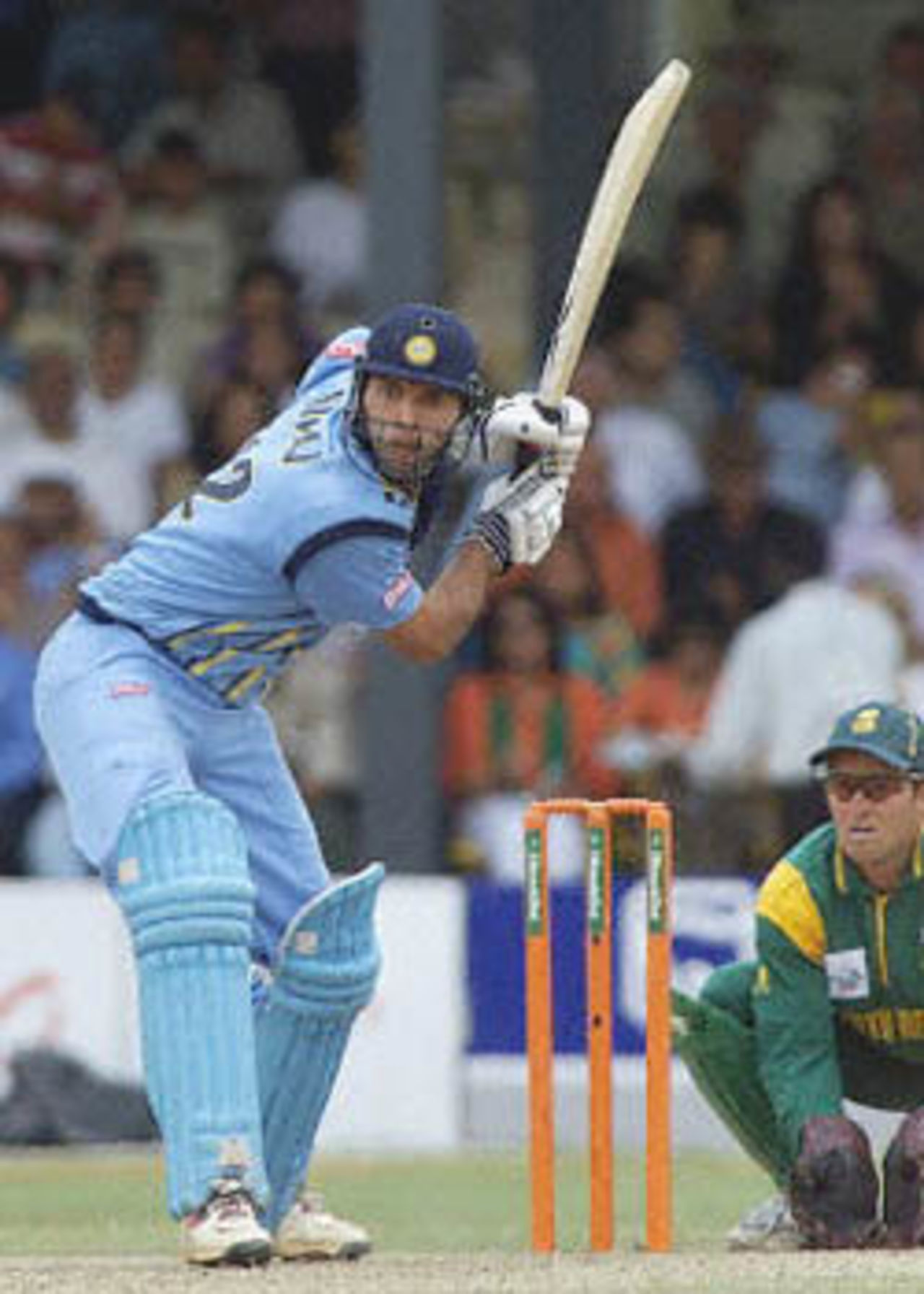 Yuvraj Singh steps out to lift the ball over the infield, ICC KnockOut, 2000/01, 2nd Semi Final, India v South Africa, Gymkhana Club Ground, Nairobi, 13 October 2000.
