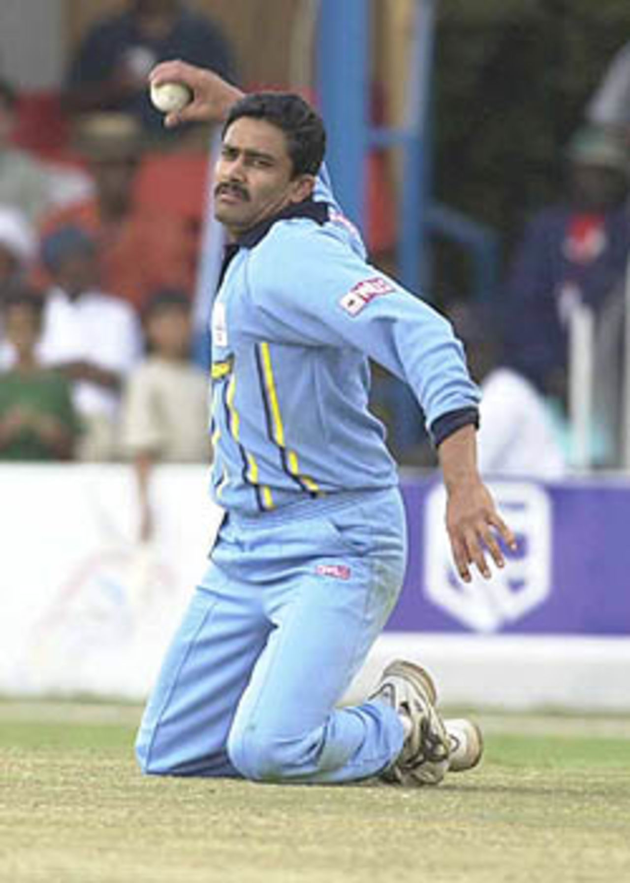 Kumble on the verge of throwing the ball after making a sliding stop, ICC KnockOut, 2000/01, Final, India v New Zealand, Gymkhana Club Ground, Nairobi, 15 October 2000.