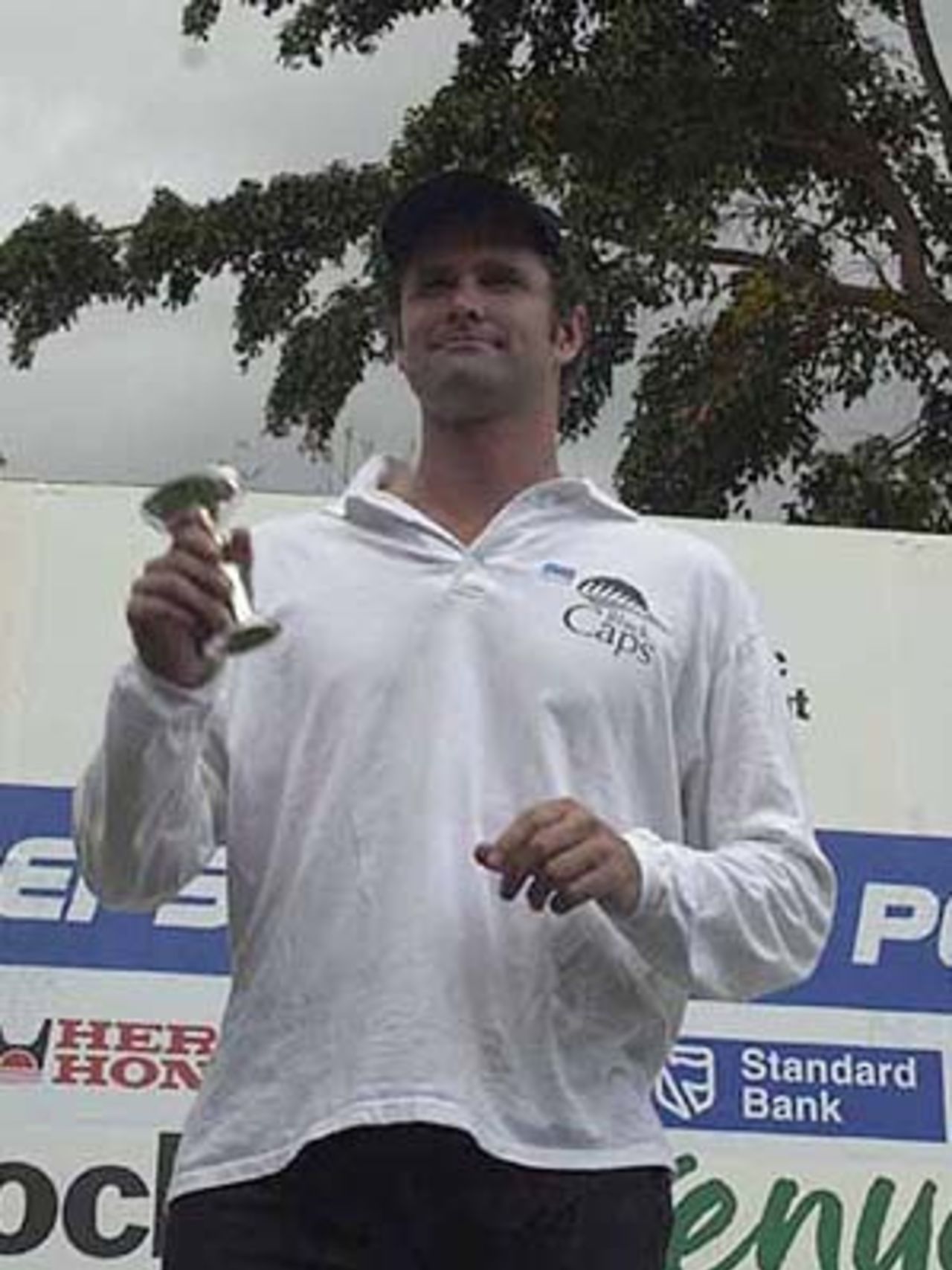 Chris Cairns proudly displays his Man of the Match Award, ICC KnockOut, 2000/01, Final, India v New Zealand, Gymkhana Club Ground, Nairobi, 15 October 2000.