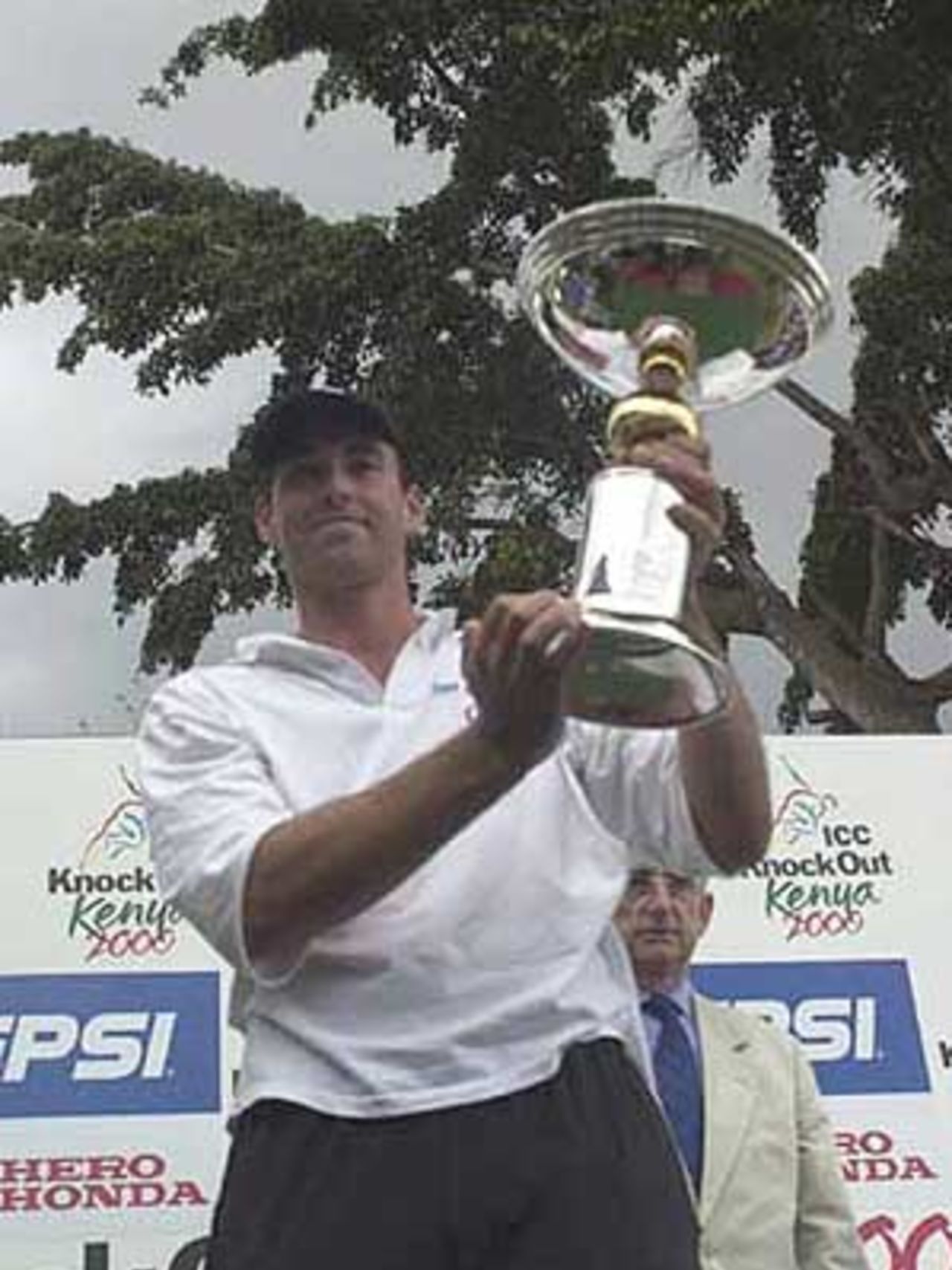 Fleming proudly holds aloft the ICC KnockOut Trophy, ICC KnockOut, 2000/01, Final, India v New Zealand, Gymkhana Club Ground, Nairobi, 15 October 2000.