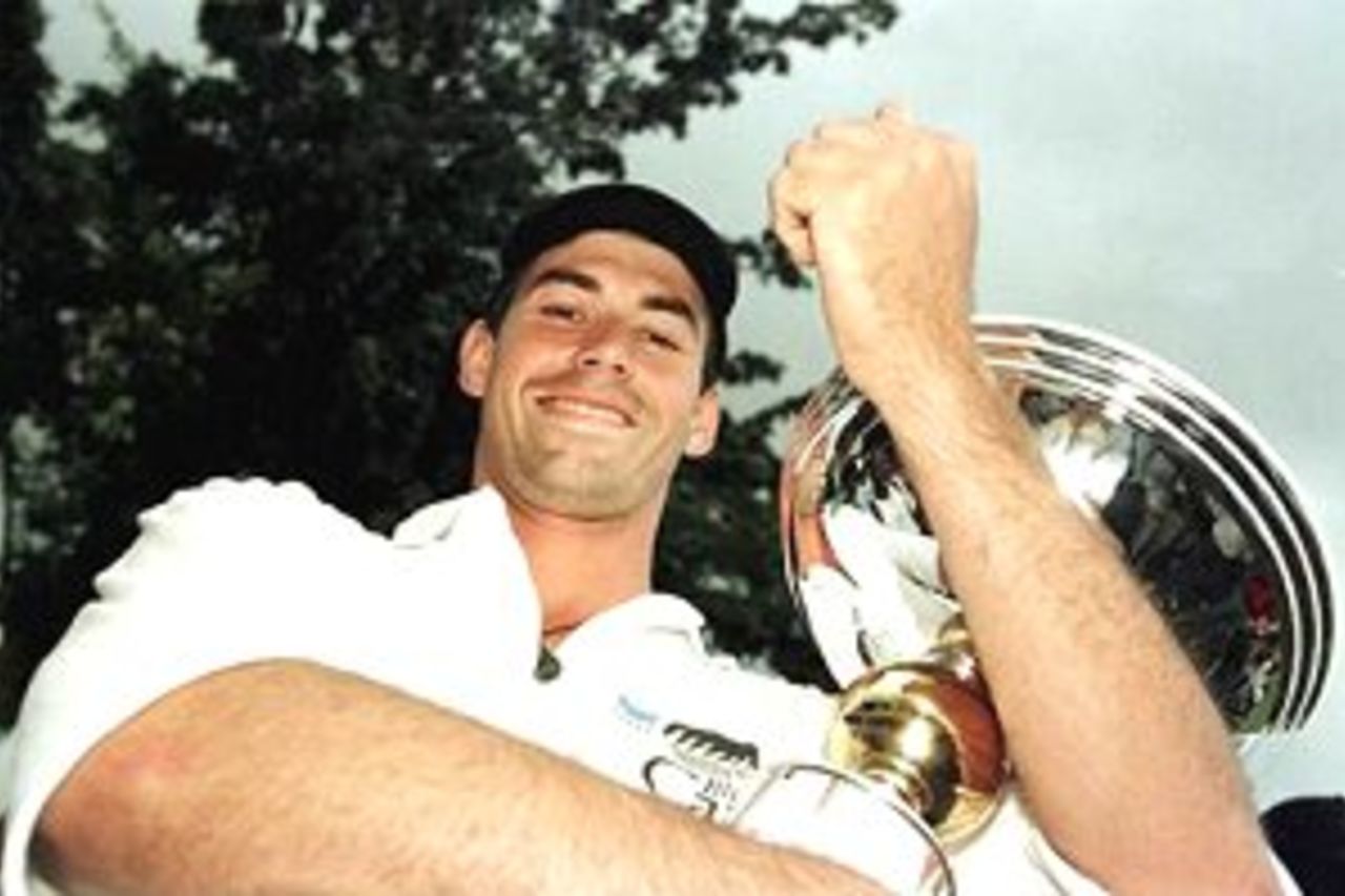 15 Oct 2000: Stephen Fleming the captain of New Zealand keeps a tight grip on the trophy after beating India after the India v New Zealand Final of the ICC Knockout Tournament at the Gymkhana Ground, Nairobi, Kenya