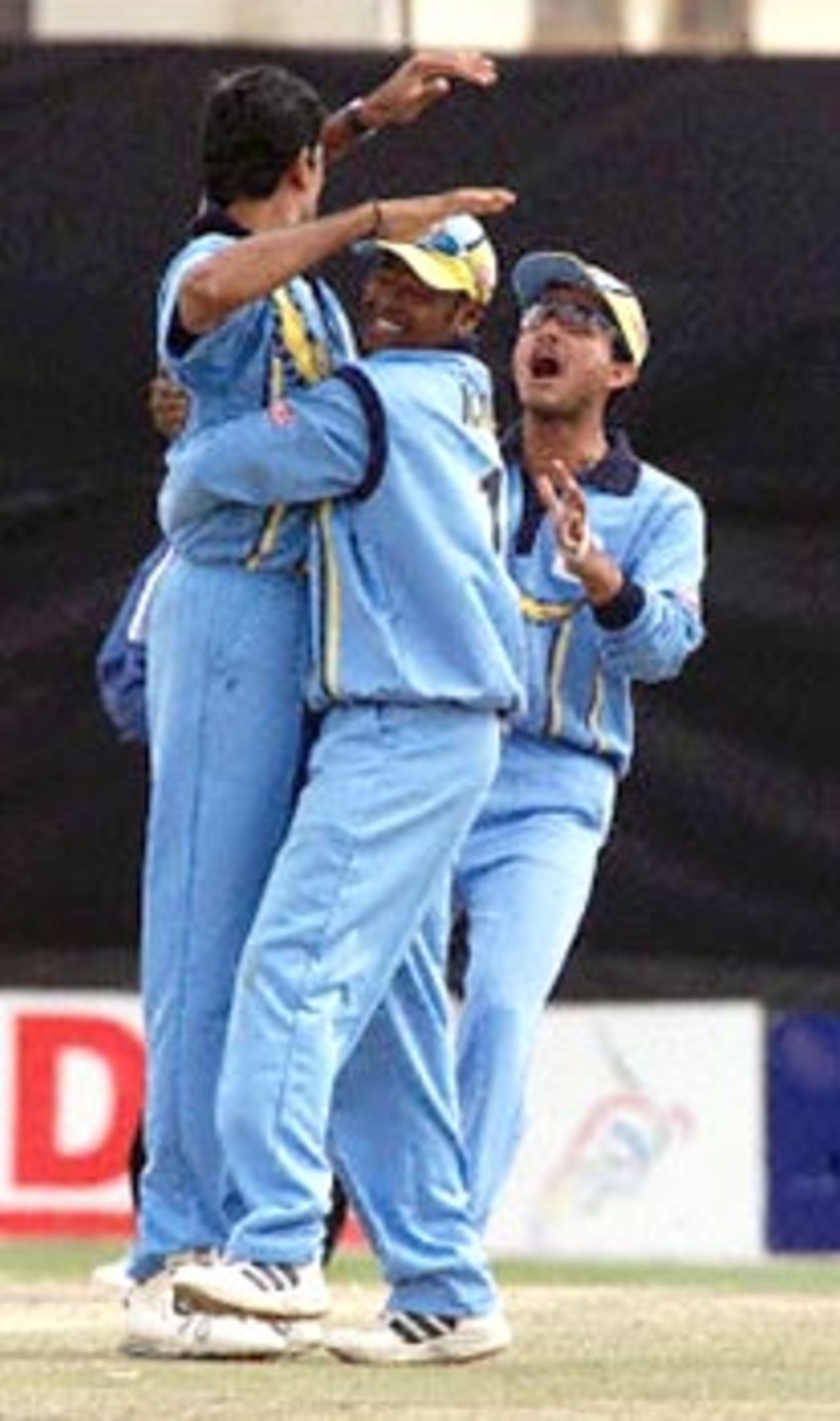 Kambli hugs Prasad while Ganguly is elated about the fall of a new Zealand wicket. ICC KnockOut 2000/01, Final, India v New Zealand, Gymkhana Club Ground, Nairobi 15 October