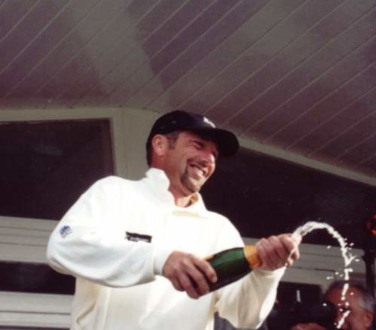 Matthew Maynard celebrates on the balcony at Sophia Gardens in Sept. 2000 after Glamorgan gain promotion to Division One of the County Championship in 2001