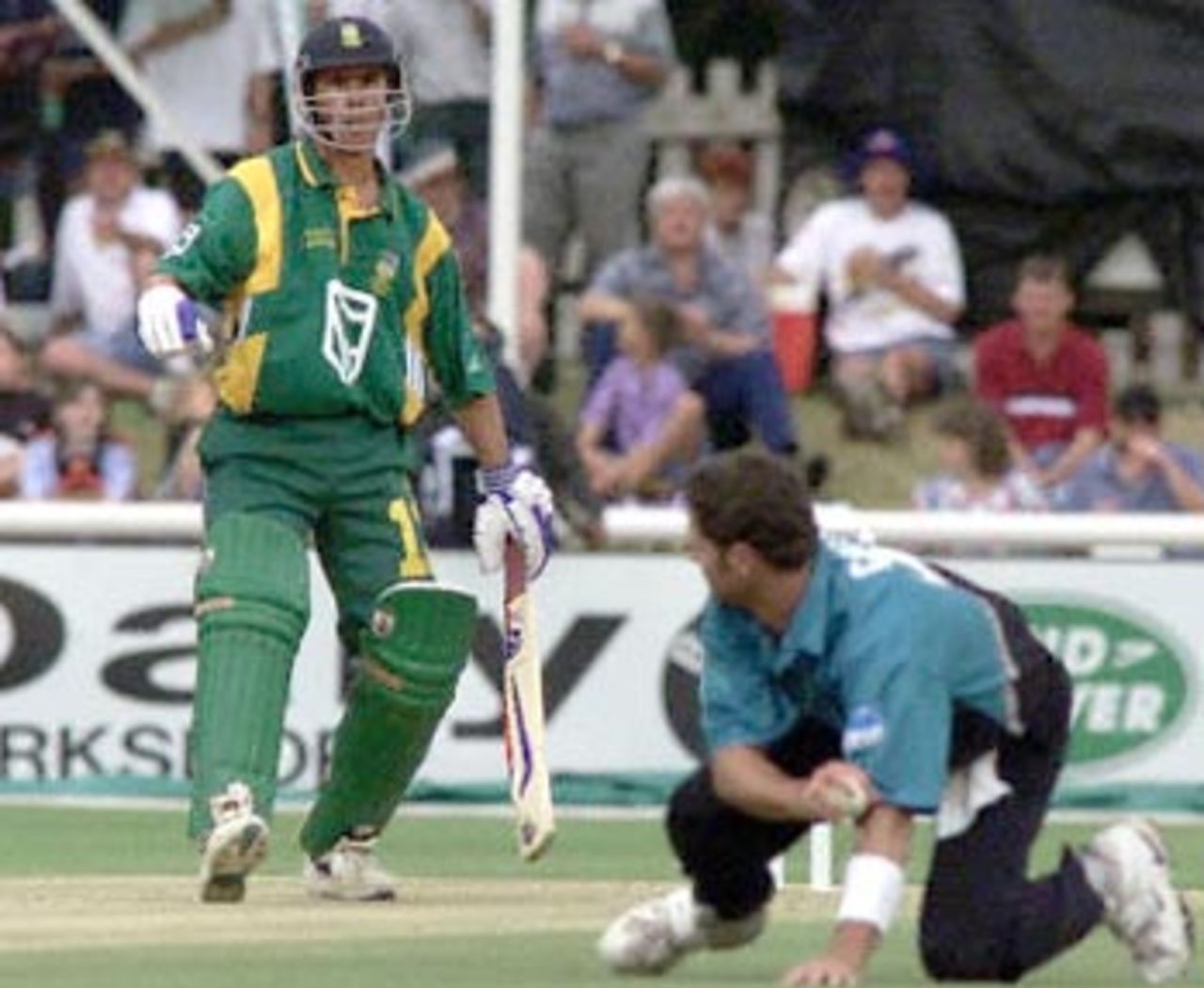 Cairns effects good stop off his own bowling. New Zealand in South Africa 2000/01, 1st ODI, South Africa v New Zealand North West Cricket Stadium, Potchefstroom, 20 October 2000