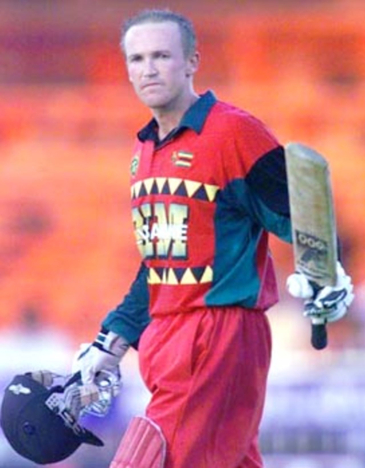 Andy Flower acknowledging after a spectacular ton. Coca-Cola Champions Trophy 2000/01, 2nd Match, Sri Lanka v Zimbabwe Sharjah C.A. Stadium, 21 October