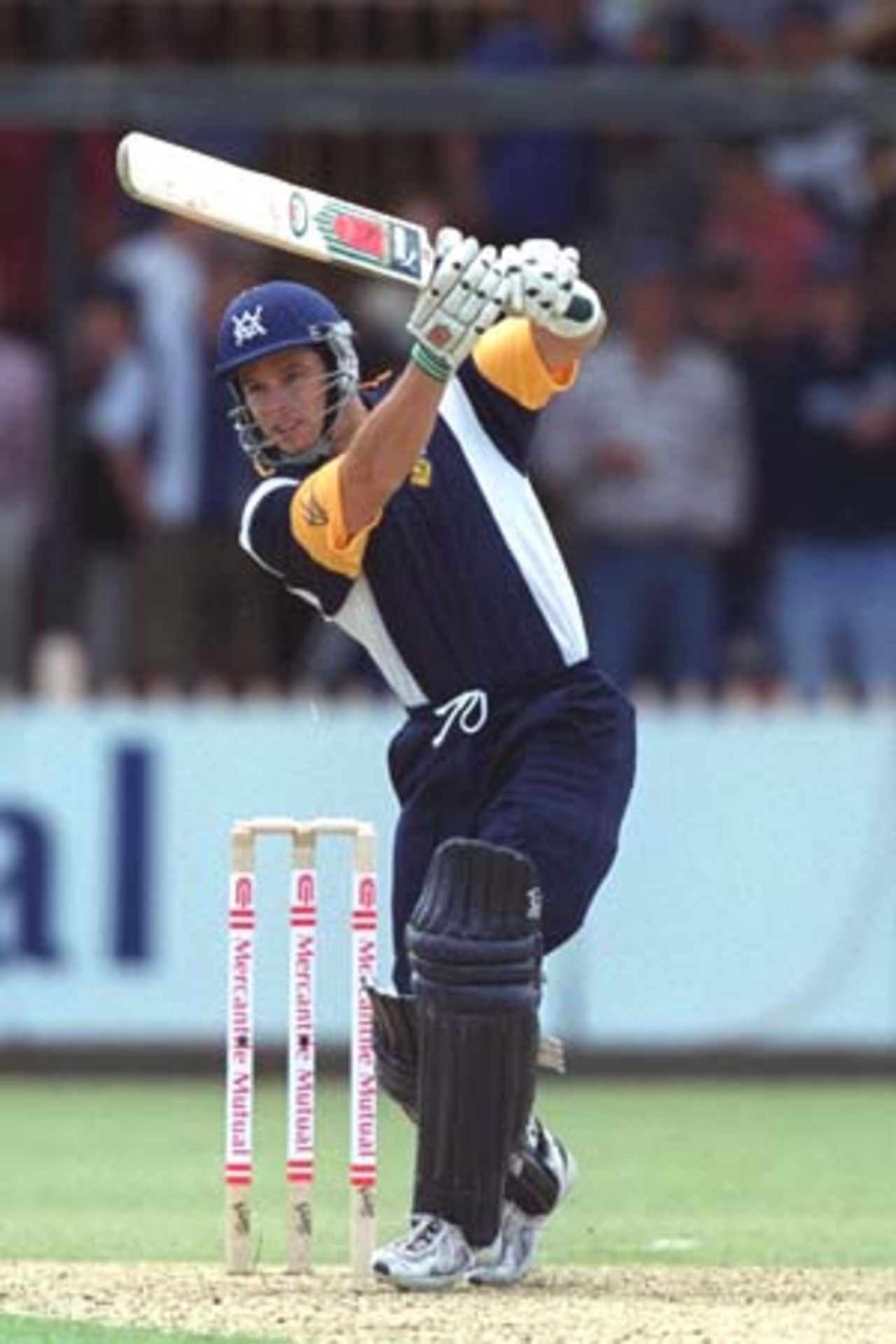 15 Oct 2000 :Brad Hodge of Victoria hits out at North Sydney Oval during the Mercantile Mutual Cup Match between Vic and NSW.